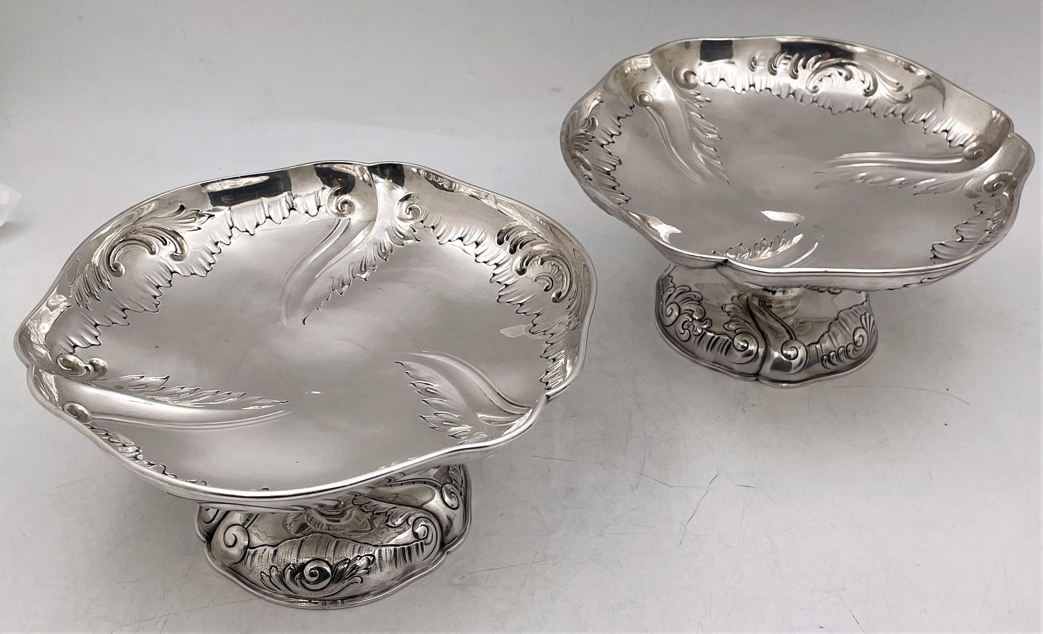 Pair of German, continental silver tazza or footed bowl by prestigious royal maker Gebrüder Friedländer, from the late 19th century, with flowing, stylized, scroll and foliate motifs in Rococo style adorning the rim and body of these elegant,
