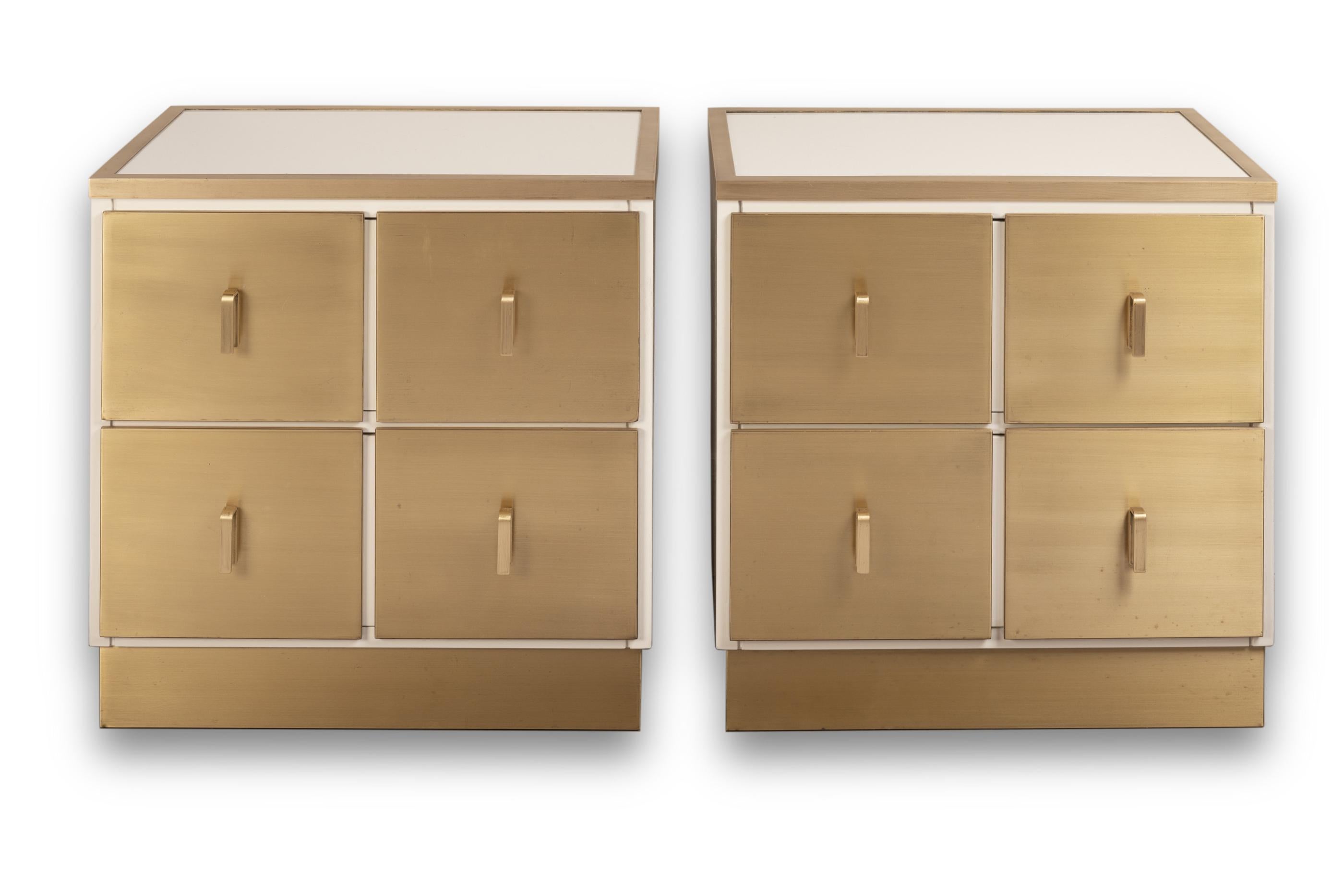 Pair of nightstands or side tables.
White lacquered wood and brass
Opens by two drawers
Design Luciano Frigerio
Made by Frigerio Di Desio, marked inside a drawer 