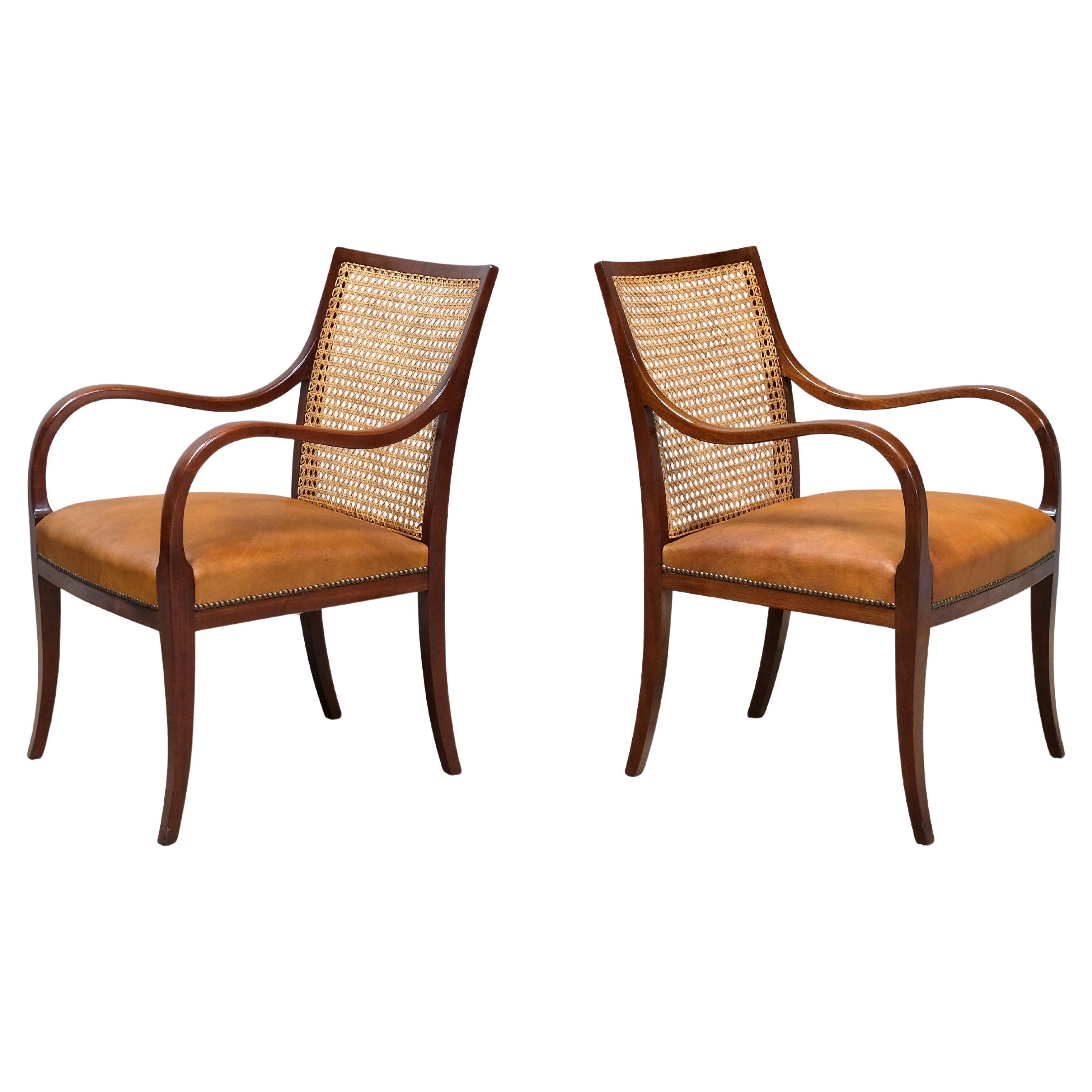 Pair of Frits Henningsen Armchairs in Mahogany, Cane and Leather, Denmark, 1931 in vendita