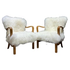 Pair of Fritz Hansen armchairs with sheepskin circa 1940 Denmark