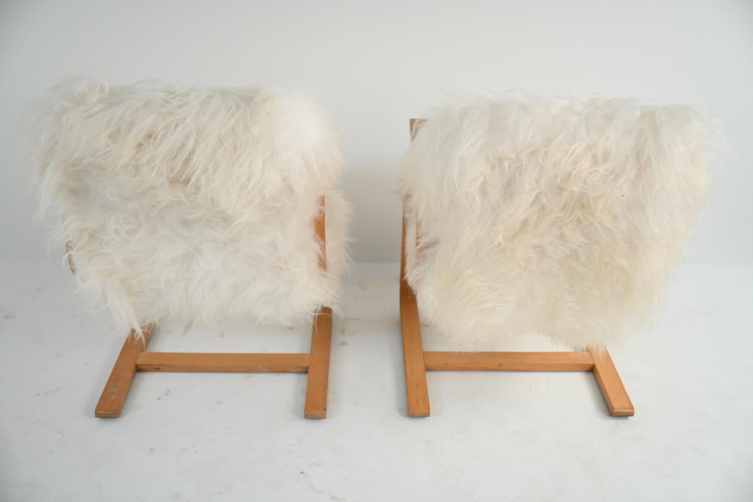 Pair of Fritz Hansen Bent Beechwood Cantilever Armchairs in Mongolian Lamb 1