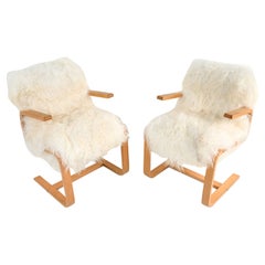 Pair of Fritz Hansen Bent Beechwood Cantilever Armchairs in Mongolian Lamb