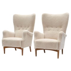 Pair Of Fritz Hansen Design Lounge Chairs