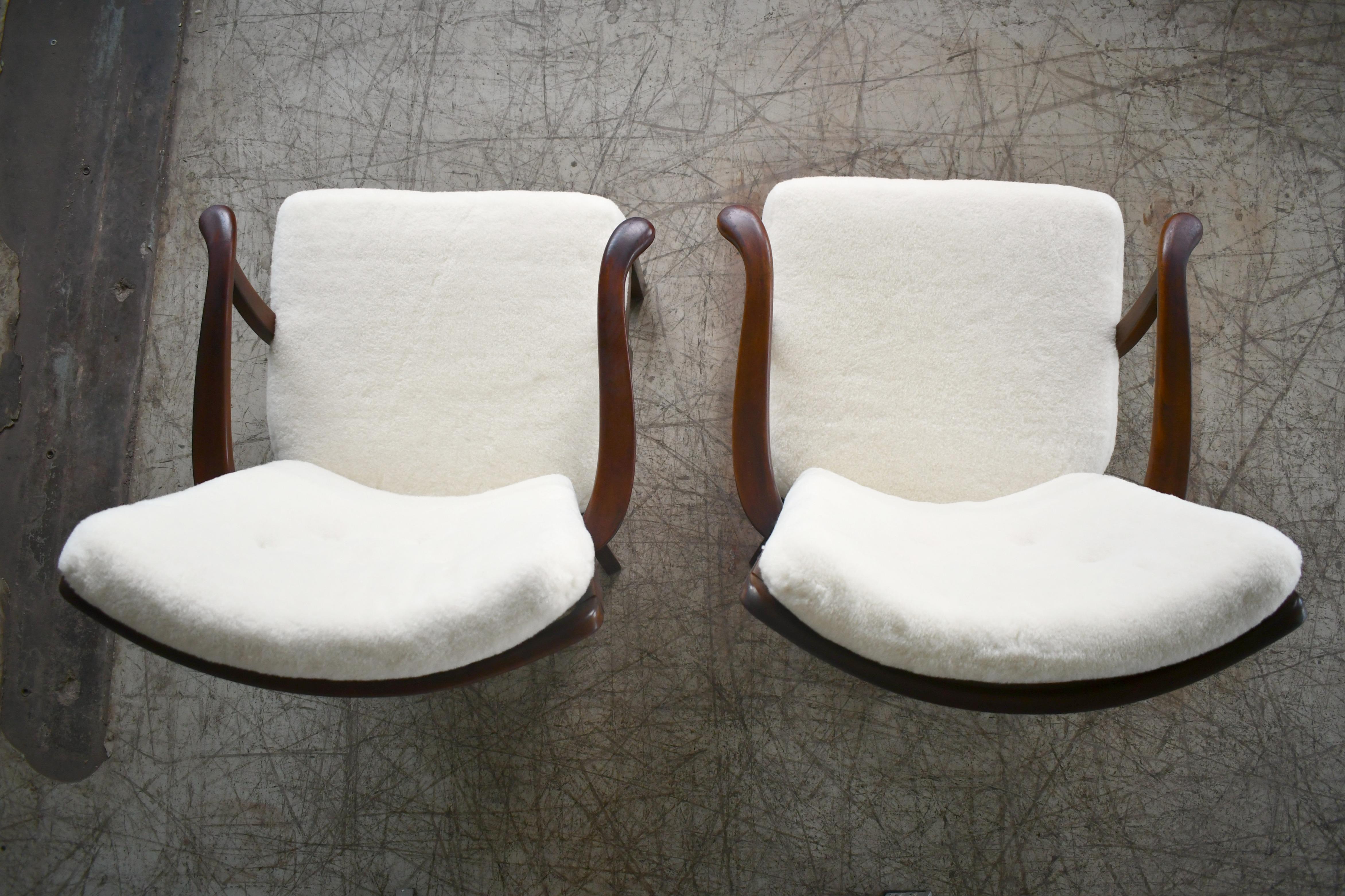 Pair of Fritz Hansen Lambswool covered Spindle Back Open Armrest Lounge Chairs 4