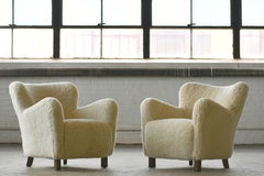 Pair of Fritz Hansen Model 1669 Lounge Chairs in Sheepskin Shearling, 1940s
