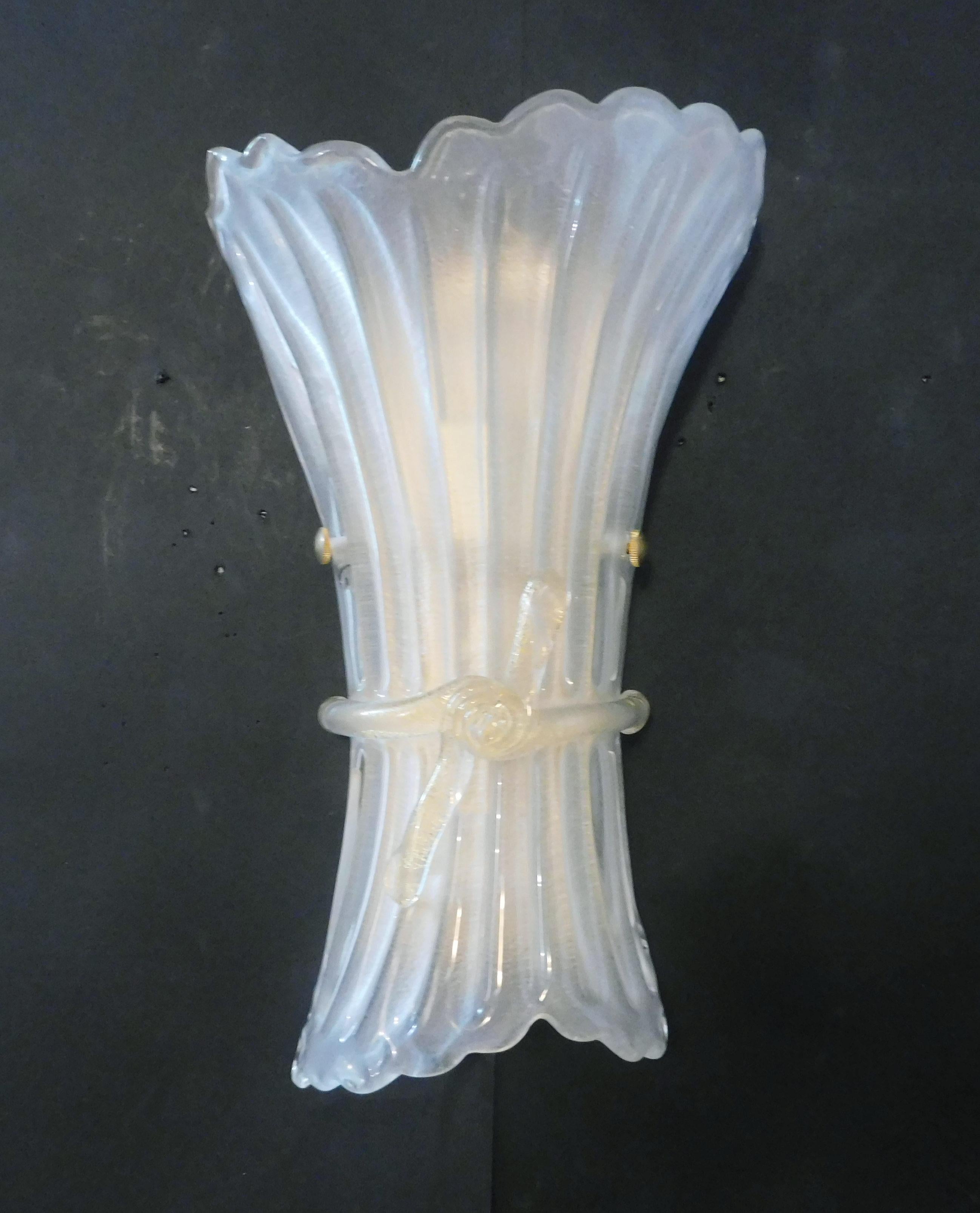 Italian wall light with a frosted Murano glass shade and a bow infused with gold flecks / made in Italy
Measures: height 15 inches, width 9 inches, depth 5 inches
2 lights / 1 in E12 or E14 type max 40W, 1 in E26 or E27 type max 60W
2 pairs