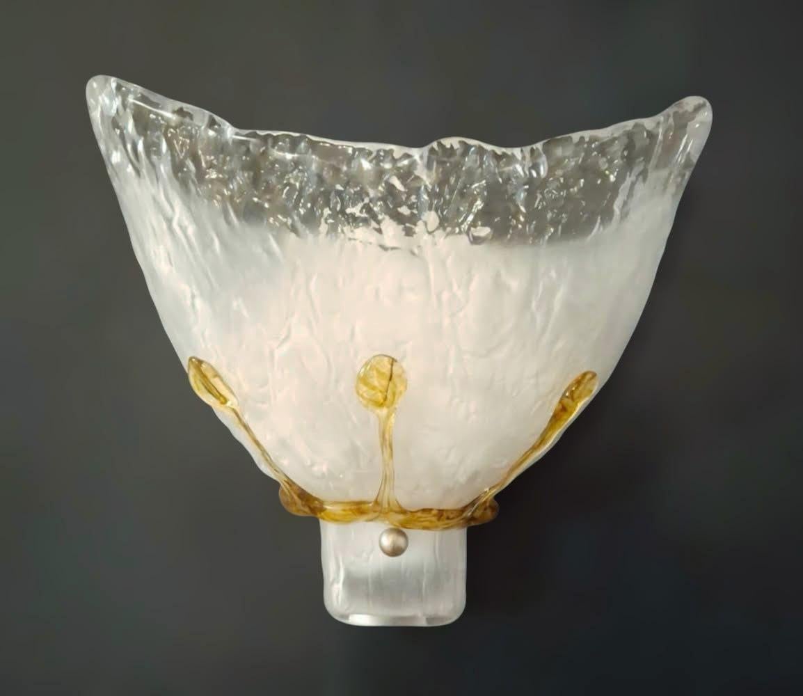 Italian wall light with frosted Murano glass shade decorated with amber details mounted on white metal structure / Made in Italy
Measures: Height 11 inches, width 10 inches, depth 5 inches
2 lights / E26 or E27 type / max 60W each
5 pairs available