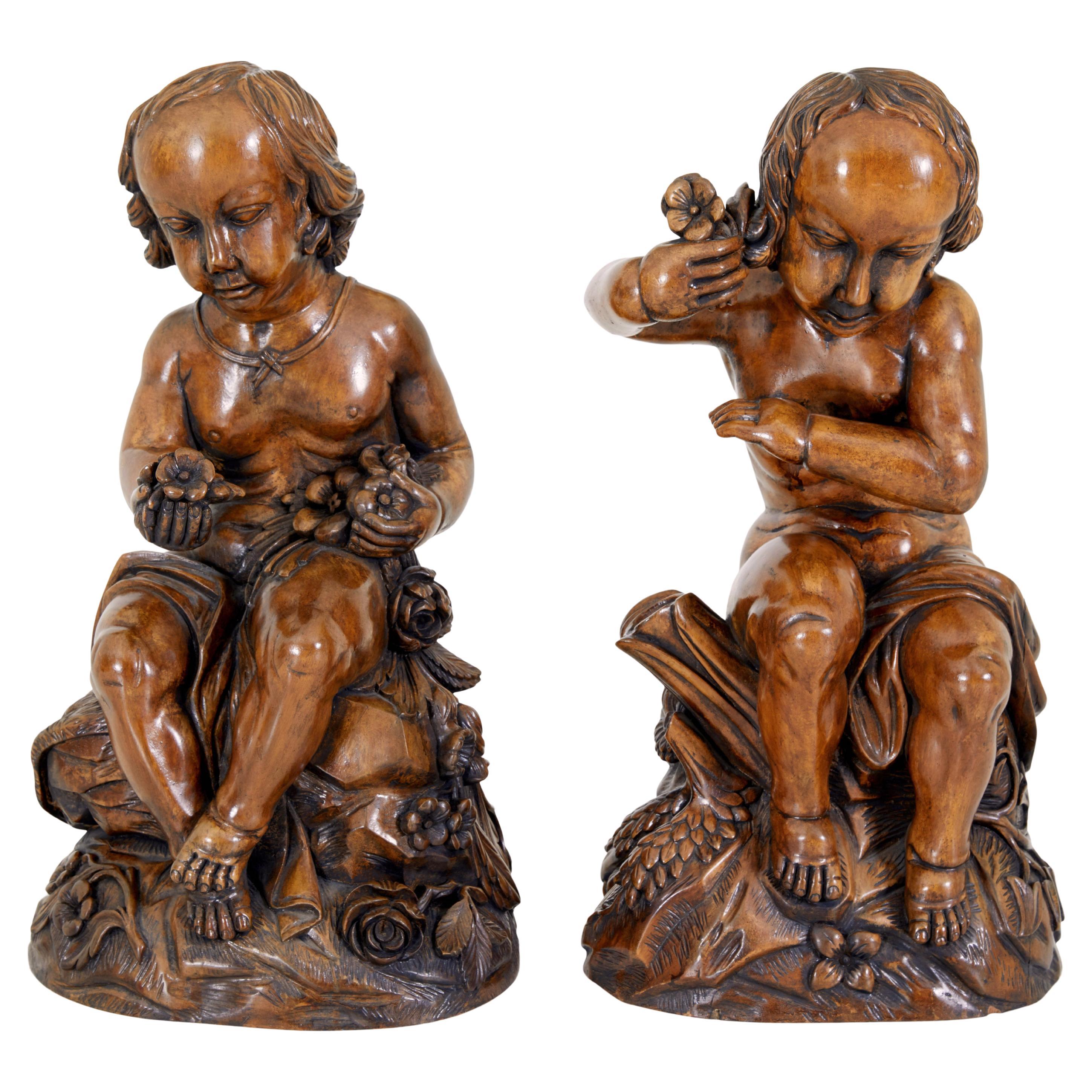 Pair of fruitwood gothic revival carved cherubs For Sale