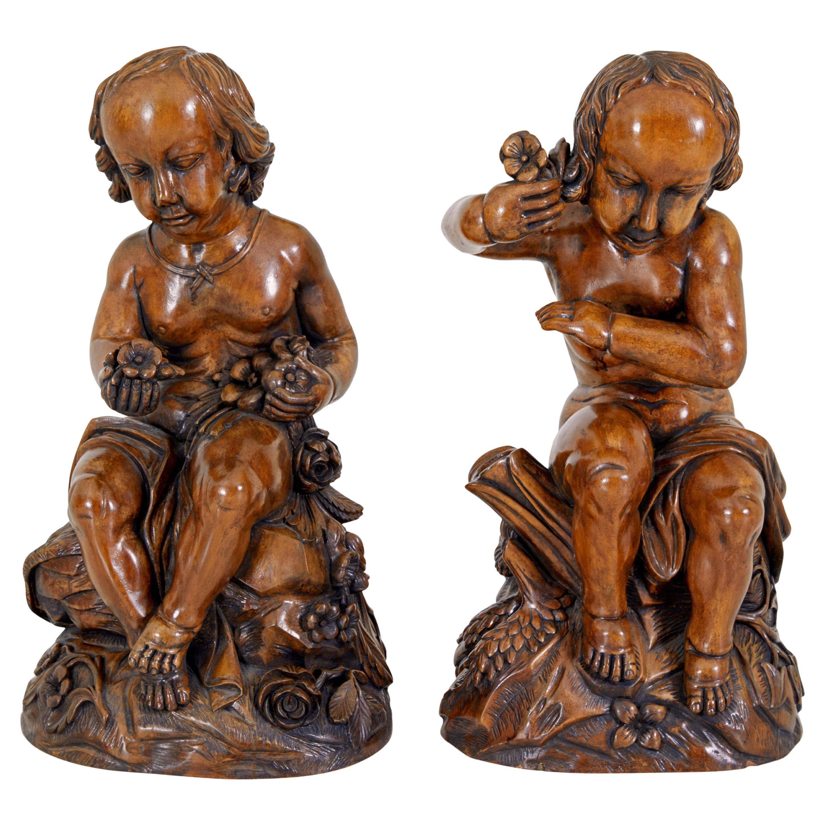 Pair of fruitwood gothic revival carved cherubs For Sale