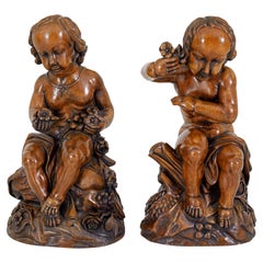 Pair of fruitwood gothic revival carved cherubs