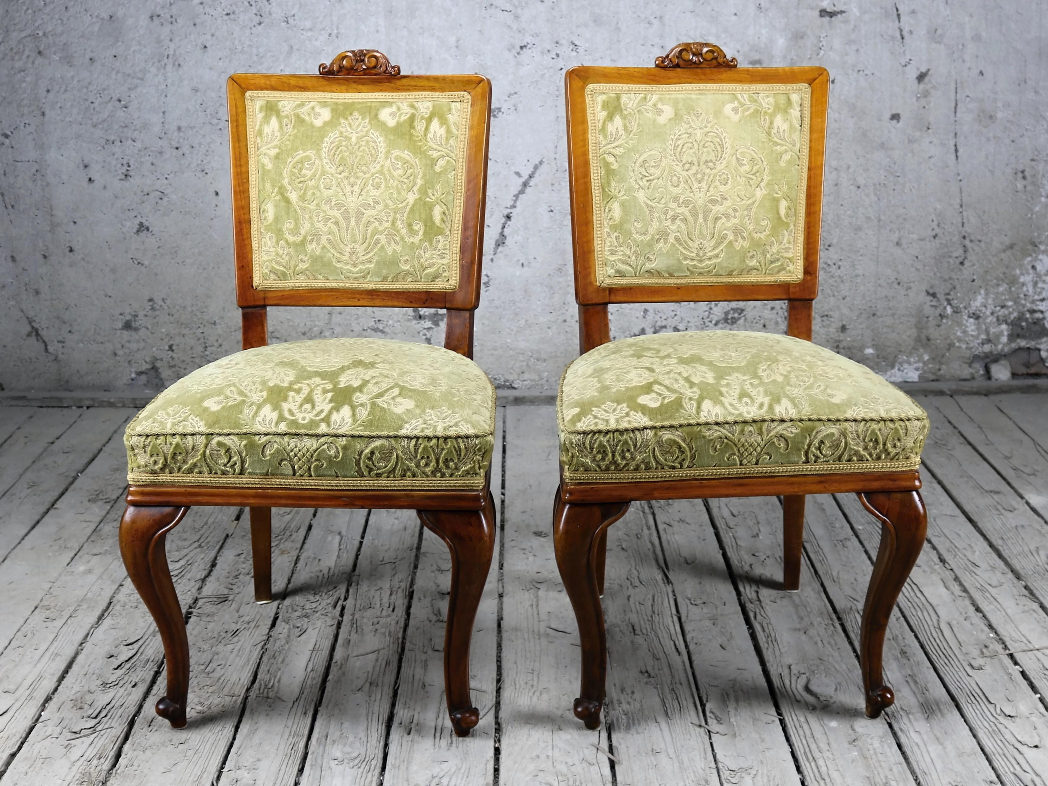 Pair of Austro-Hungarian very comfortable fruitwood side chairs with carved top. These armchairs are part of the seating set consisting of two armchairs, two chairs and sofa.