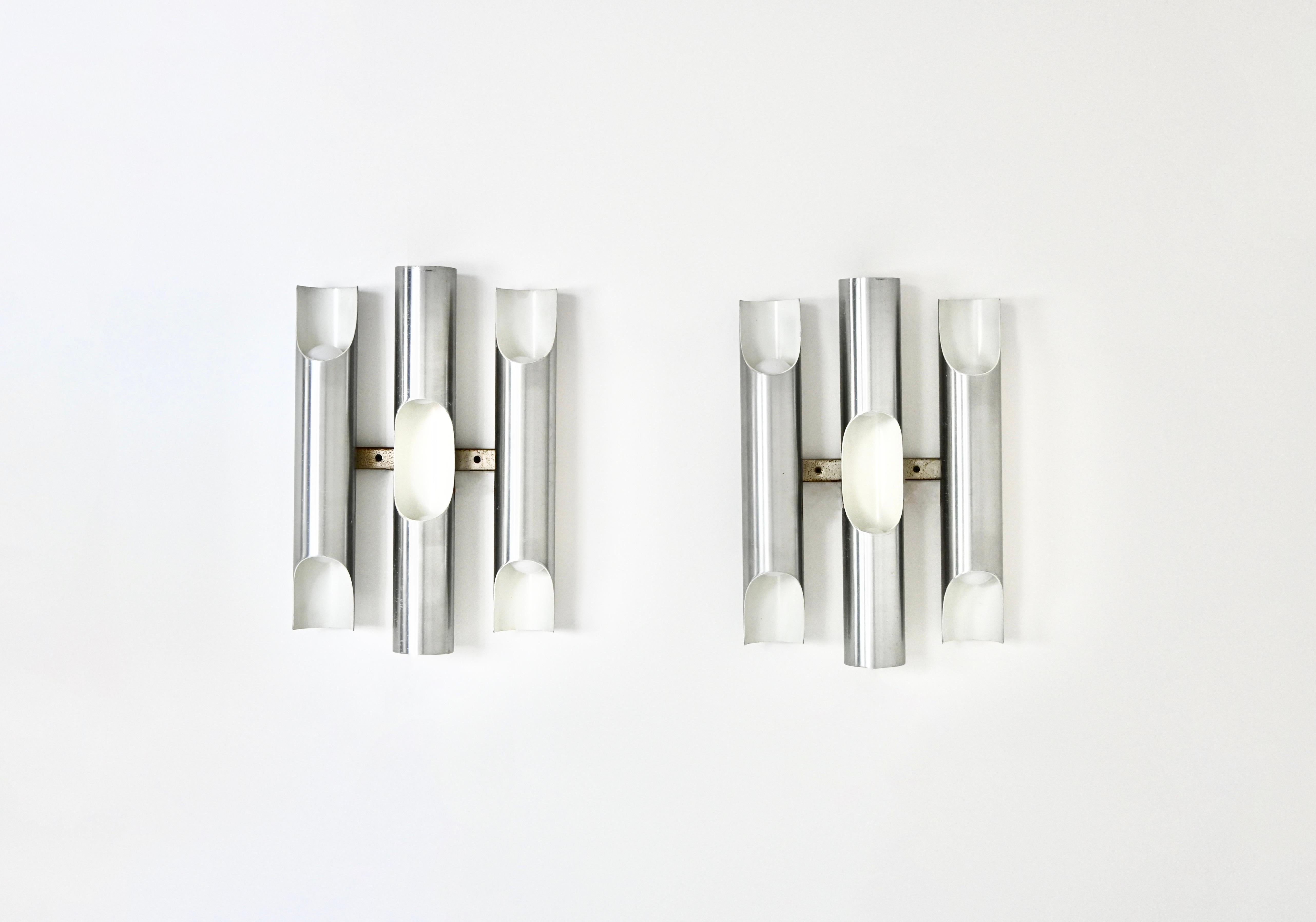 Pair of metal sconces designed by Maija Liisa Komulainen and manufactured by Raak, Fuga model. Wear due to time and age
FOR SHIPPING, REQUEST US FOR RECEIVE THE BEST PRICE
