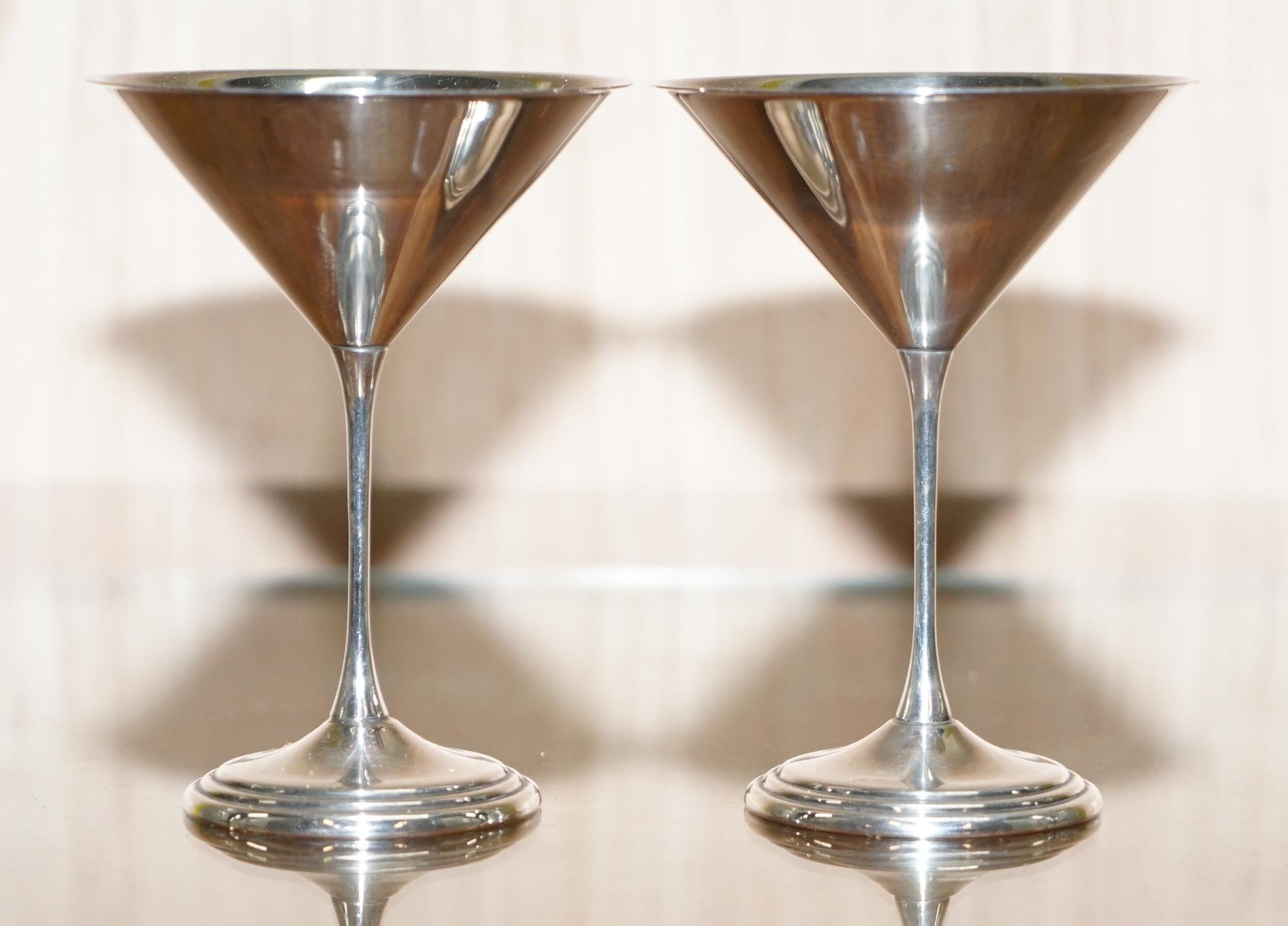 We are delighted to this stunning and original pair of solid sterling silver Sheffield made 1996 Martini cocktail glasses

A very good looking and decorative pair, talk about making a drink a sense of occasion! Imagine asking a guest if they would