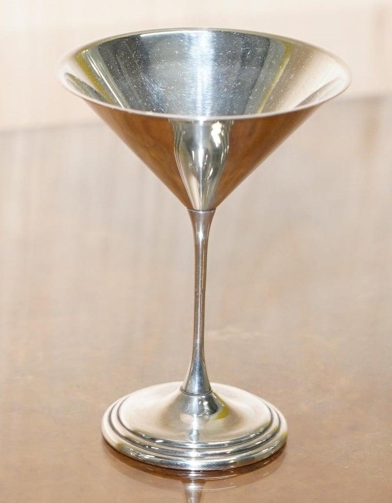 We are delighted to this stunning and original pair of solid sterling silver Sheffield made 1996 Martini cocktail glasses

A very good looking and decorative pair, talk about making a drink a sense of occasion! Imagine asking a guest if they would