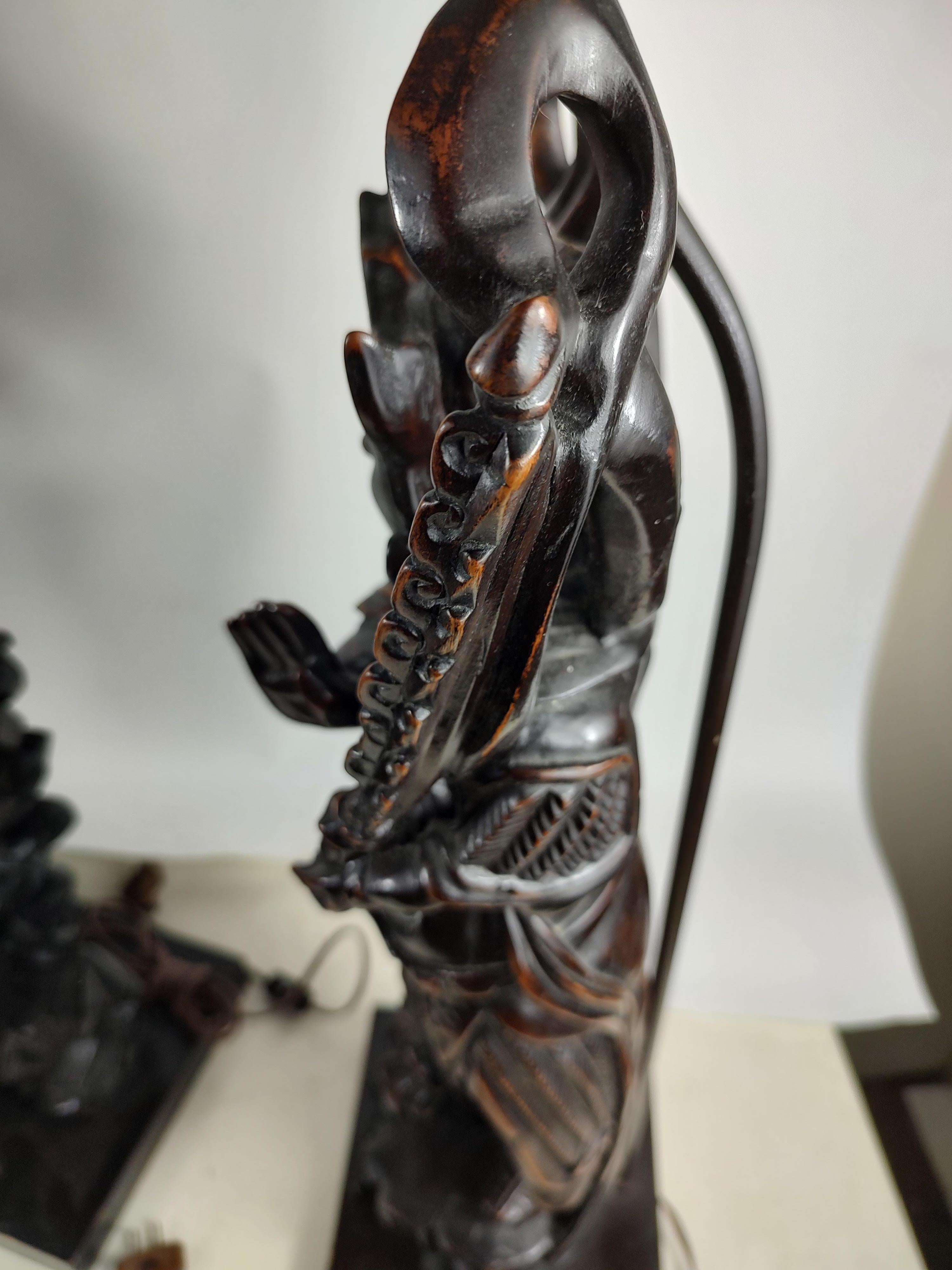 Stained Pair of Fully & Highly Carved Chinese Deity Figural Table Lamps For Sale