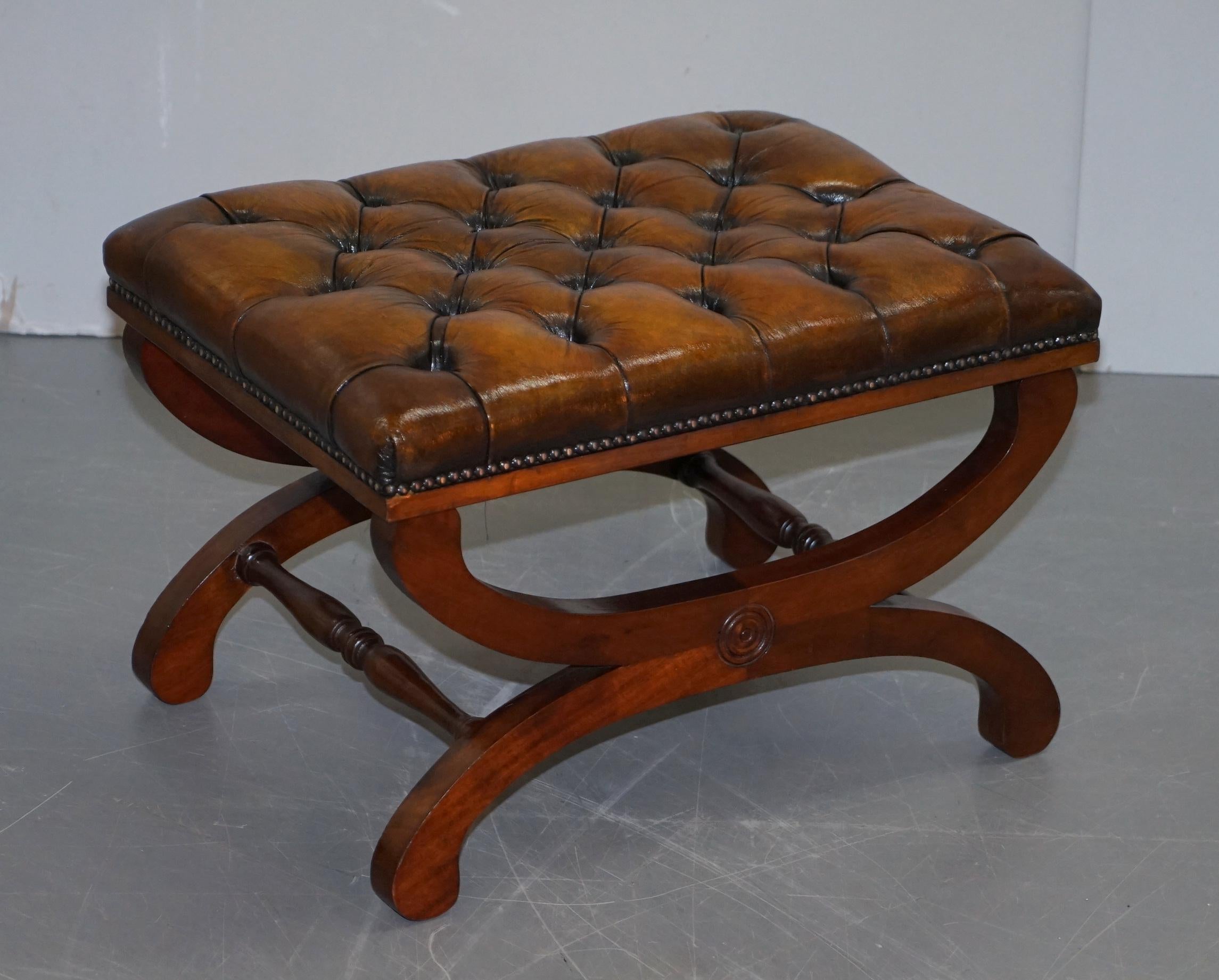 Wimbledon-Furniture

Wimbledon-Furniture is delighted to offer for sale this sublime pair of vintage fully restored Whisky Brown leather Chesterfield footstools

A very good looking and comfortable pair of stools, the leather has been stripped