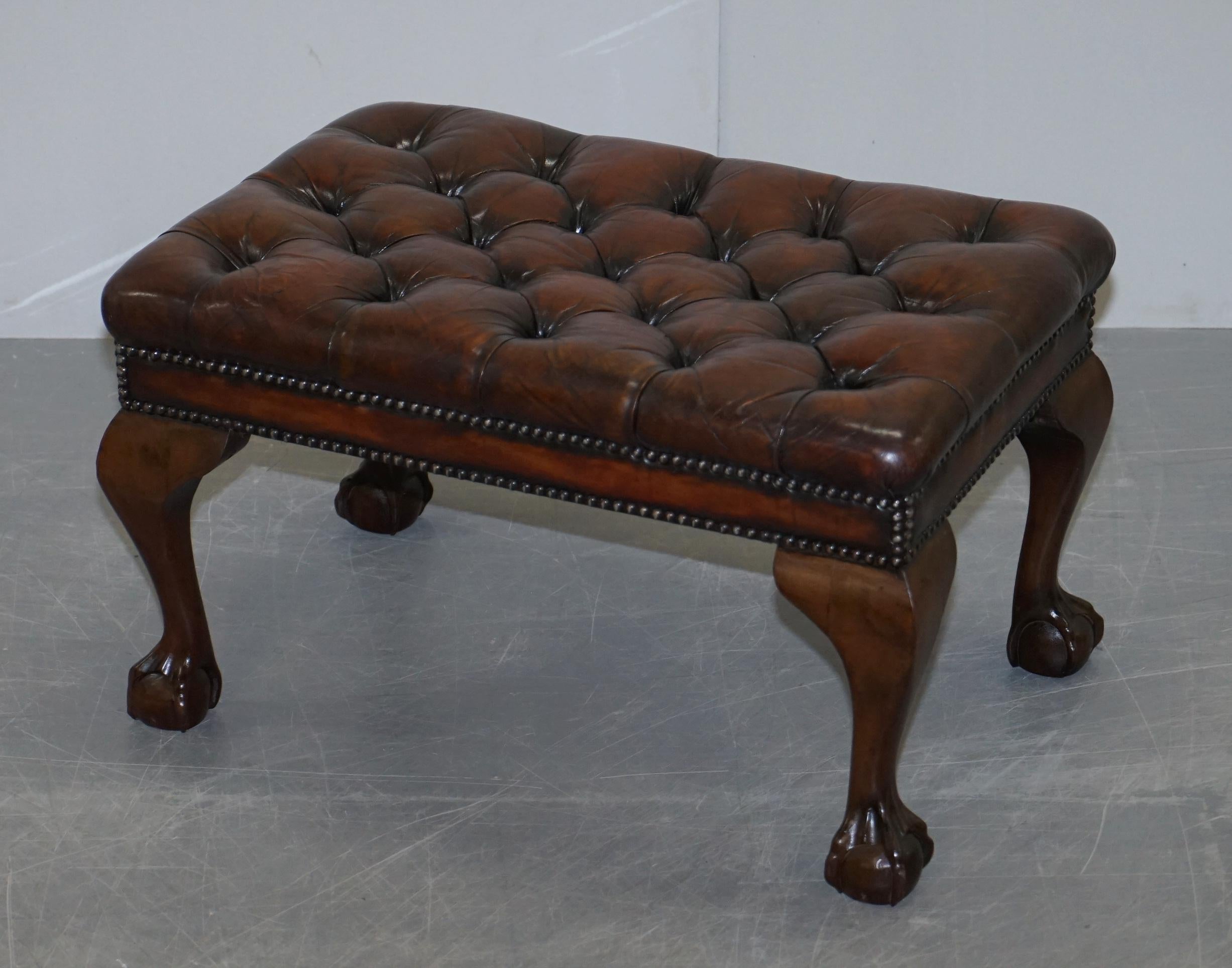 We are delighted to offer for sale this stunning pair of fully restored hand dyed brown leather Chesterfield footstools

A good looking and well made pair of fully restored hand dyed cigar brown leather Chesterfield tufted footstools. The legs are