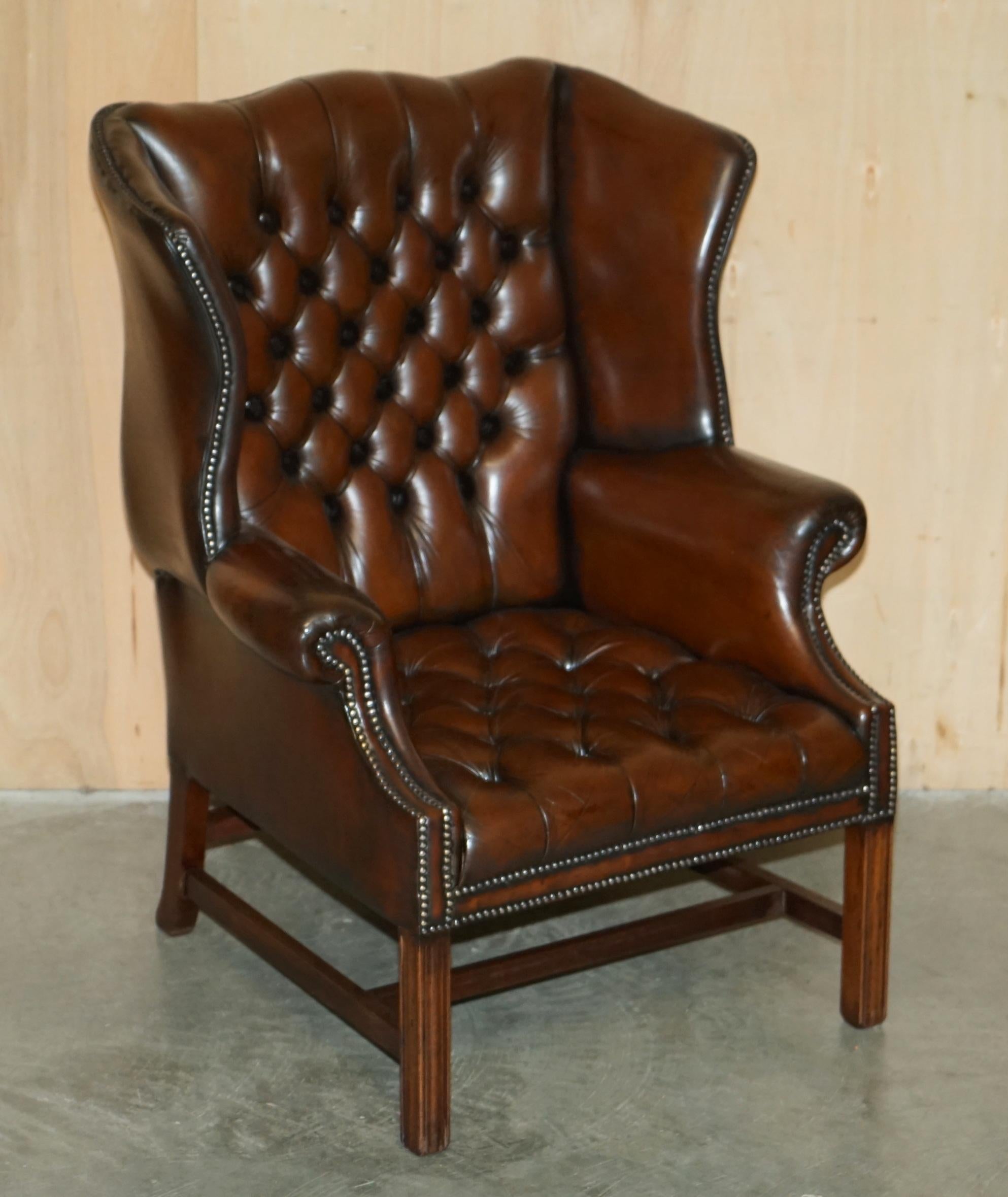 Royal House Antiques

Royal House Antiques is delighted to offer for sale this lovely pair of vintage circa 1960's, Chesterfield Cigar brown leather, fully restored wingback armchairs with Georgian H Frame bases and Tufting to the back and seat