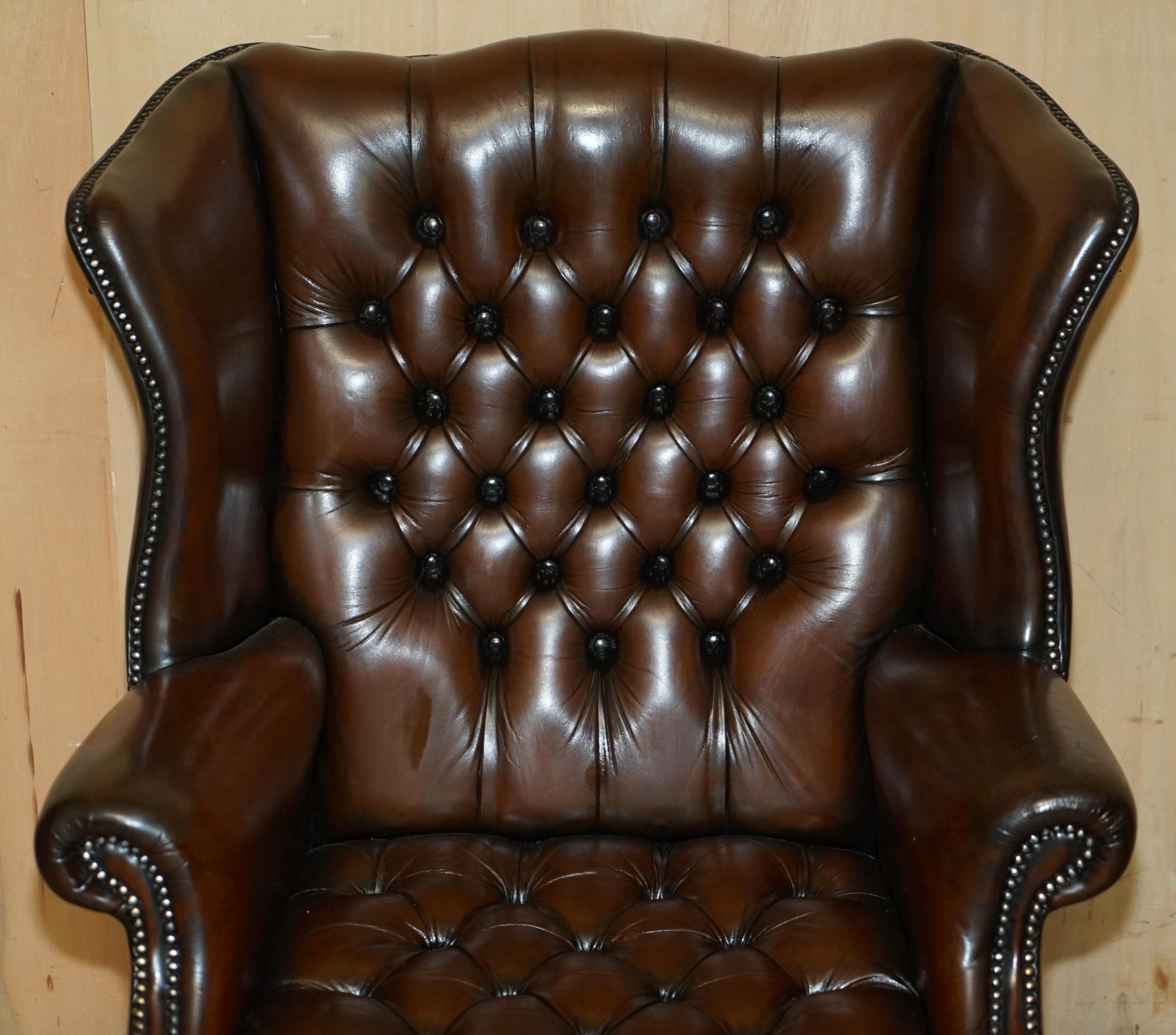 English PAIR OF FULLY RESTORED GEORGIAN H FRAMED CHESTERFIELD TUFTED WINGBACK ARMCHAIRs For Sale