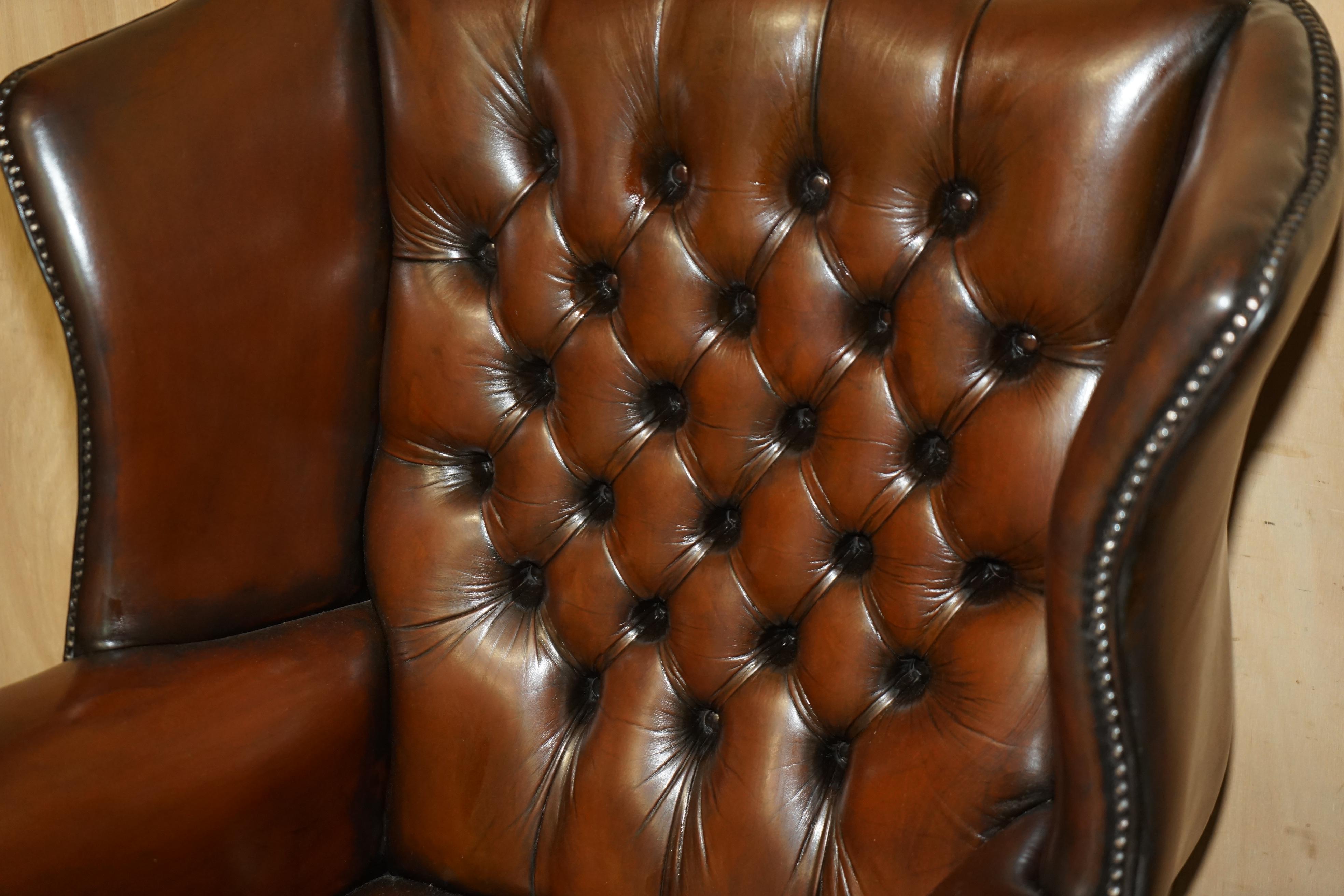 Hand-Crafted PAIR OF FULLY RESTORED GEORGIAN H FRAMED CHESTERFIELD TUFTED WINGBACK ARMCHAIRs For Sale