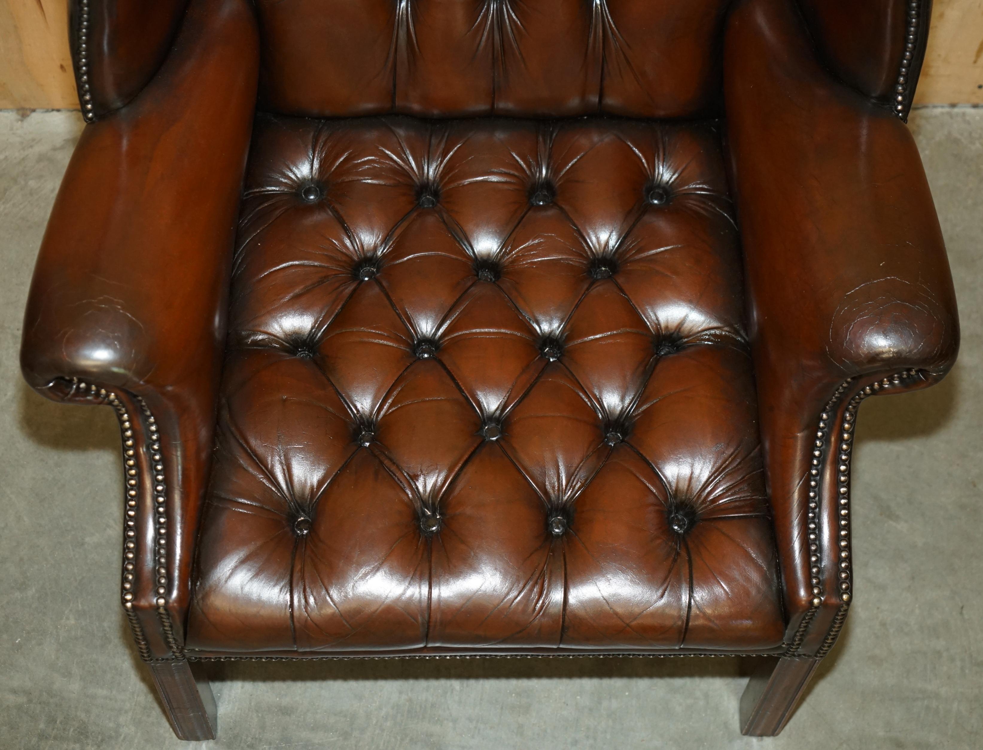 Leather PAIR OF FULLY RESTORED GEORGIAN H FRAMED CHESTERFIELD TUFTED WINGBACK ARMCHAIRs For Sale