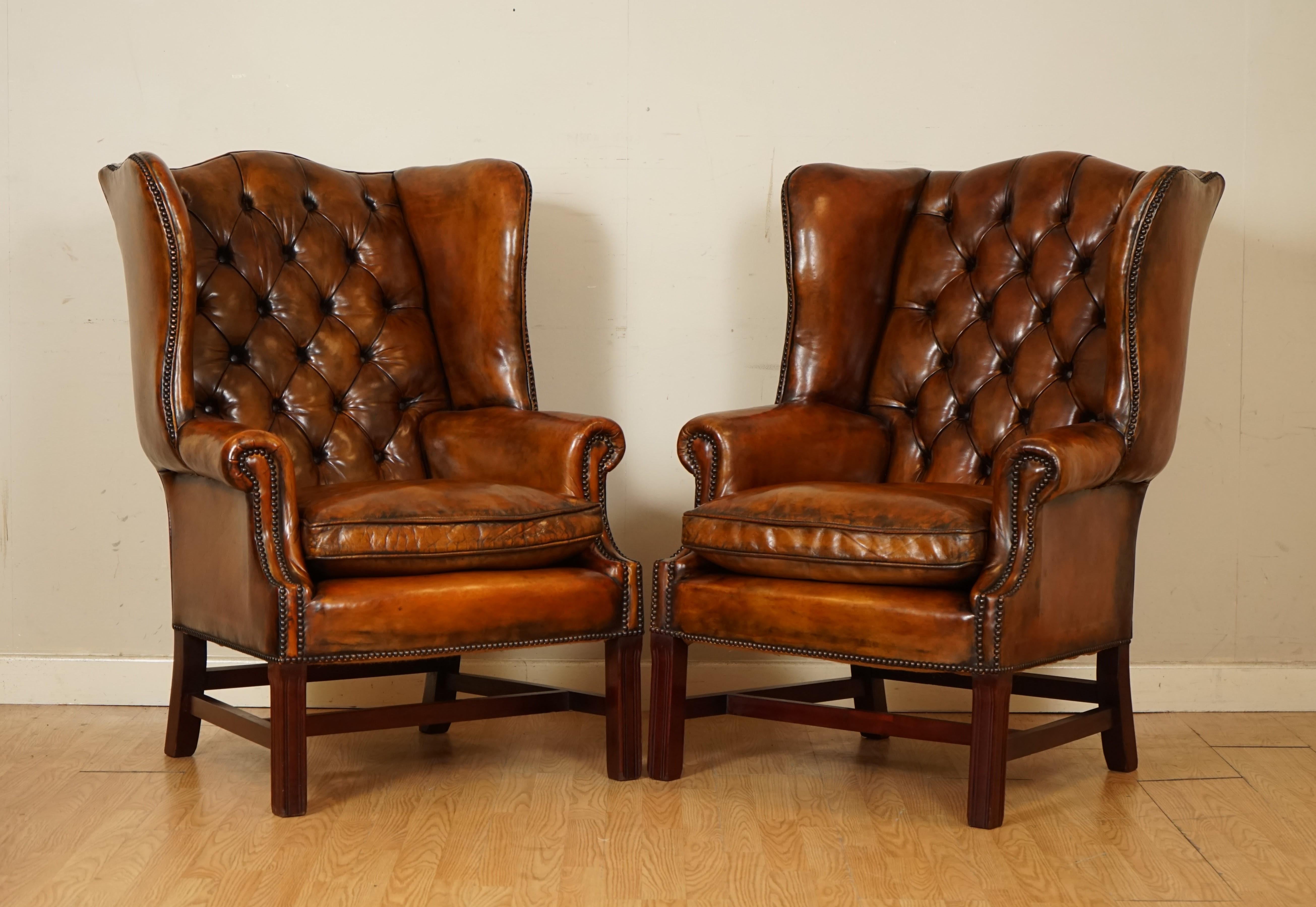 We are delighted to offer for sale these lovely pair of very comfortable feather filled cushion vintage wingback chairs.

A good looking and comfortable pair of coil-sprung vintage wingback armchairs, with feather filled seats. These are good