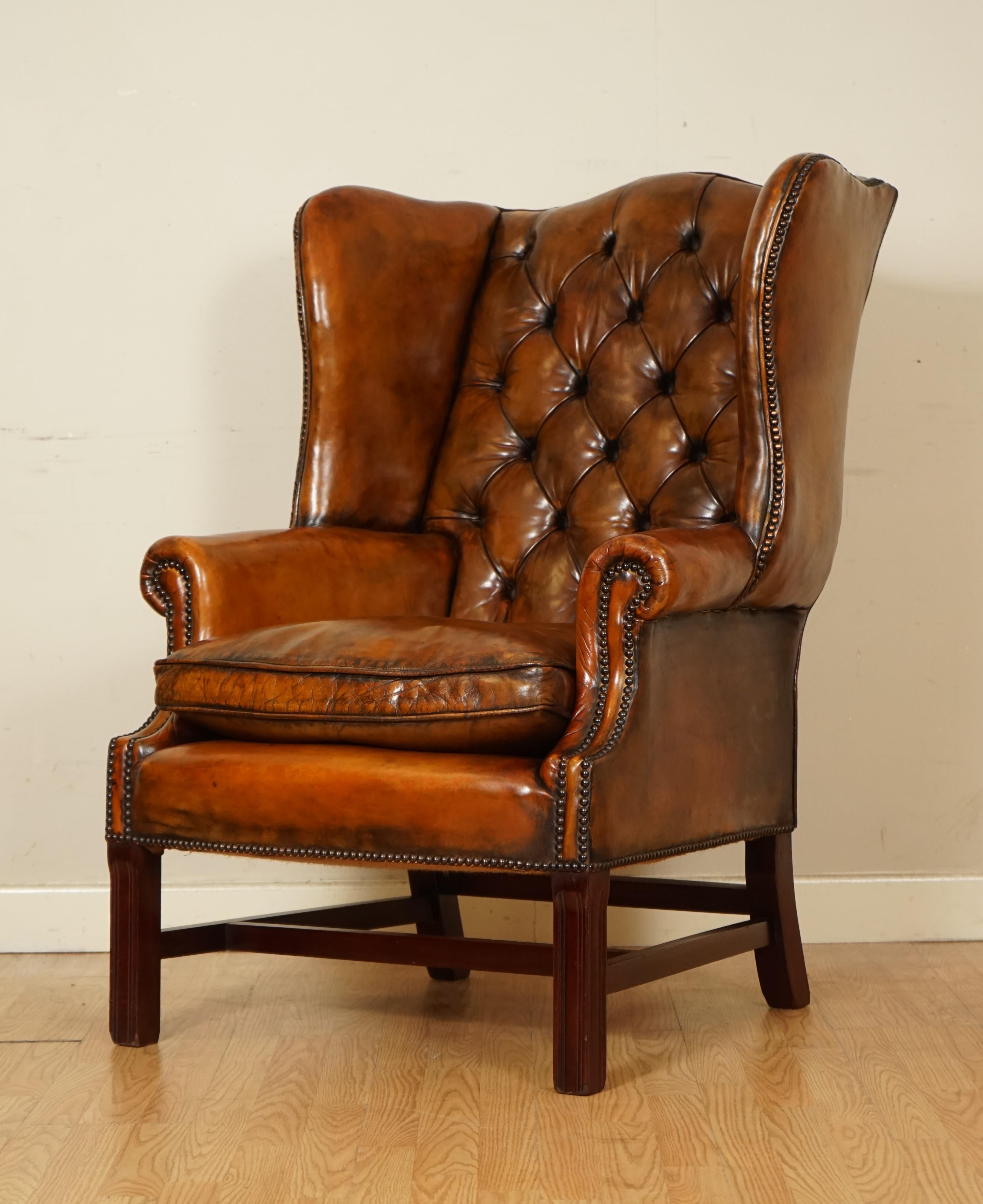 Brass Pair of Fully Restored Hand Dyed Chesterfield Wingback Chairs with Feather