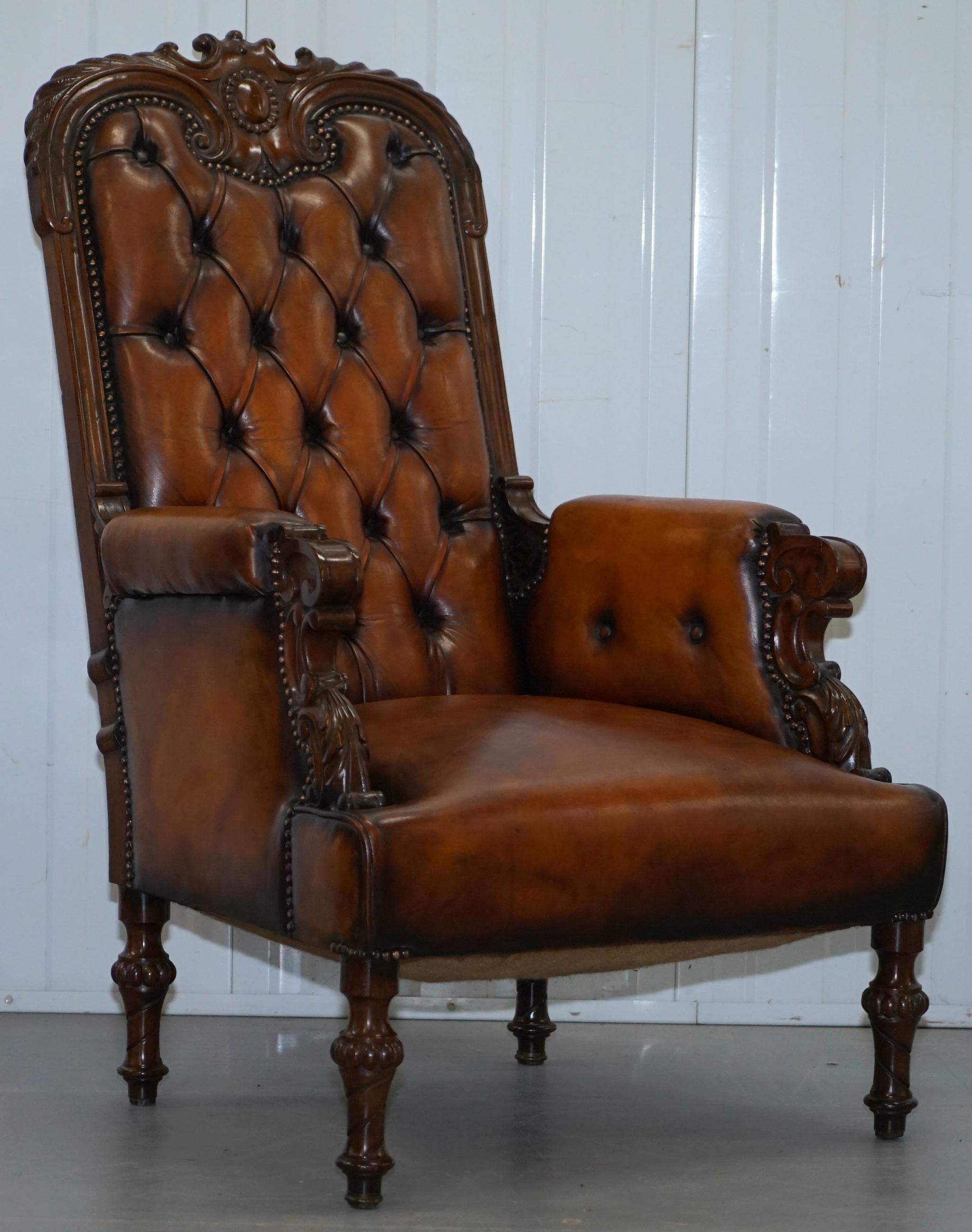 We are delighted to offer for sale this stunning pair of original fully restored Chesterfield show wood frame Victorian library reading slipper armchairs with hand dyed brown leather upholstery

A very rare and desirable pair of exceptionally