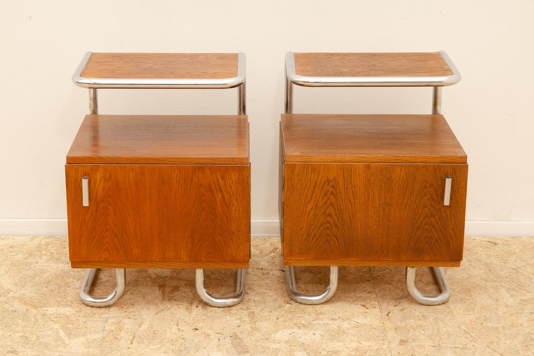 A pair of Modernist nightstands in the Bauhaus style. Outstanding timeless design. Made in the former Czechoslovakia. It was designed by Vichr & spol and made by Kovona company.

A typical example of the Bauhaus period in Central Europe. Chrome is