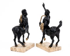 Pair of Furietti Centaurs in bronze, with parts in gilded bronze. Pair of bronze