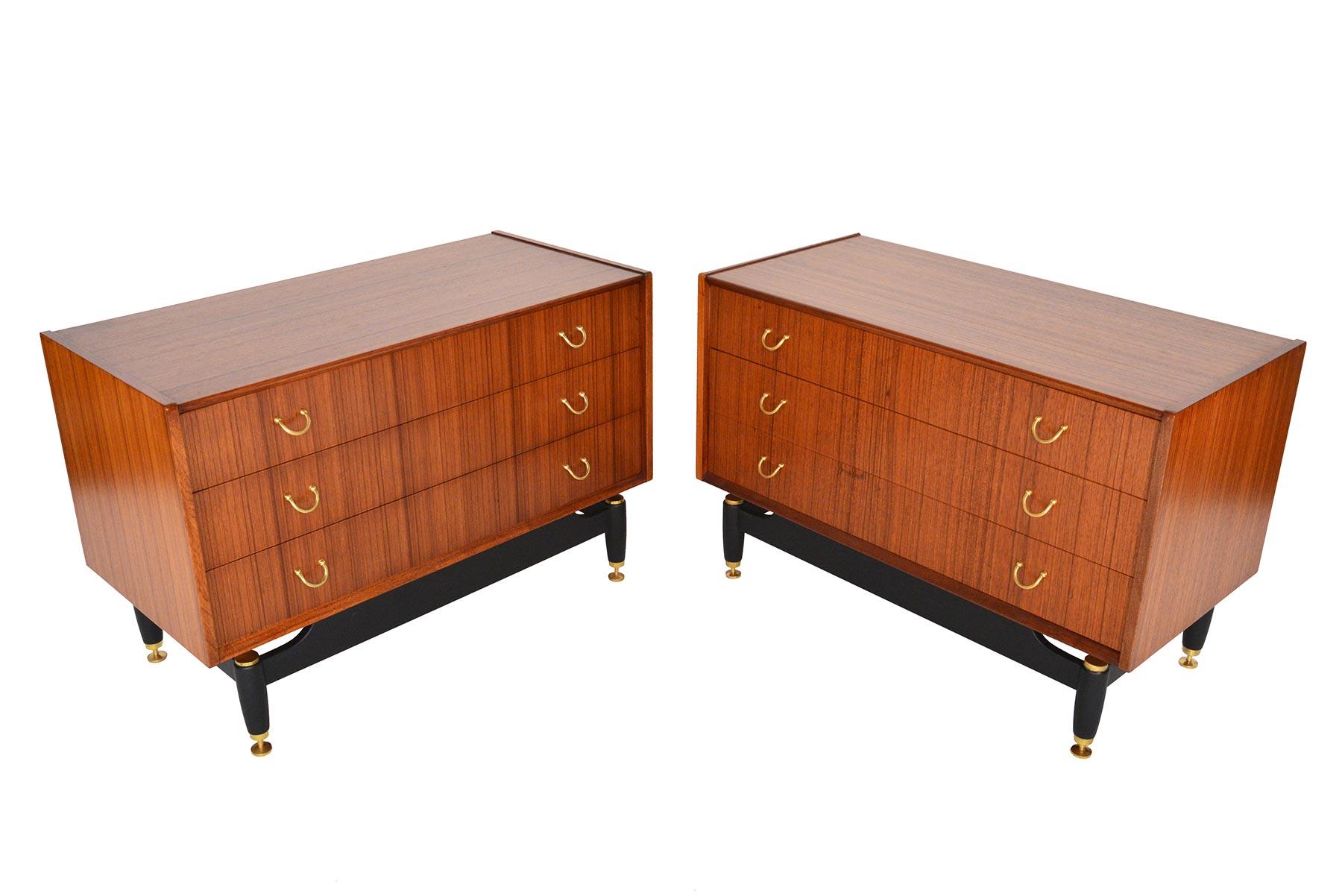 This handsome pair of G Plan Librenza range tola and black gentleman’s chests offer a Italian stylings with exceptional English construction. Each chest is cased in bookmatched tola and drawer fronts feature original brass handles. Cases float on a