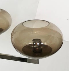 Coppia di lampadari in cromo di Gaetano Sciolari