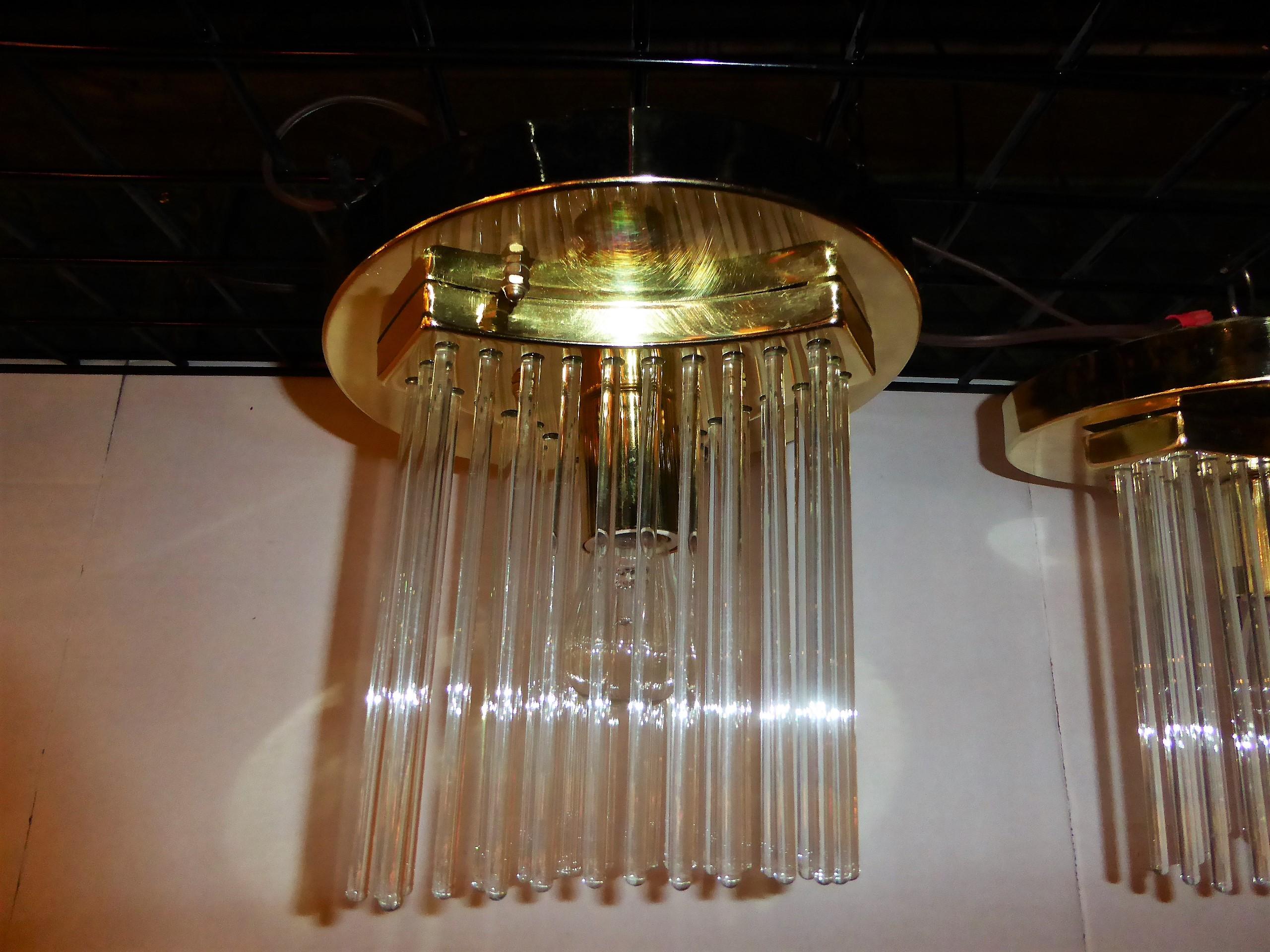 REDUCED FROM $1,800....Fine 1970s Gaetano Sciolari flush mount ceiling lights in brass with glass rods in a waterfall trifoil rectangular form surrounding the light source. Each with a single medium base bulb socket. Each with 33 blown glass rods.