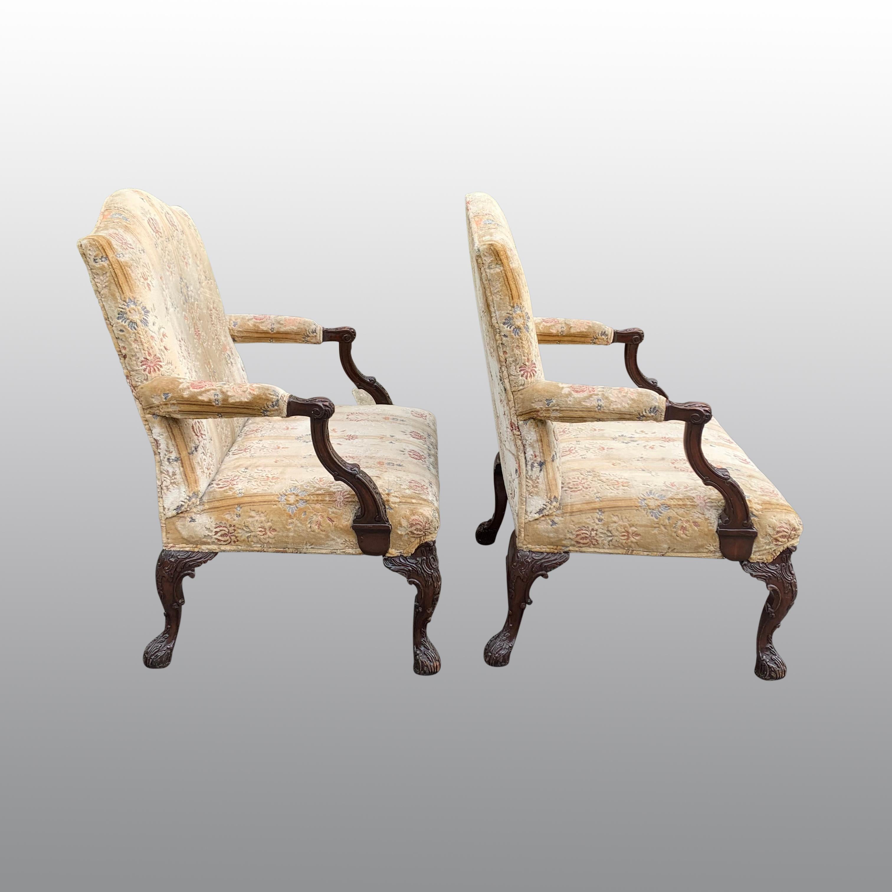 20th Century Pair of Gainsborough Library chairs in the Chippendale taste For Sale