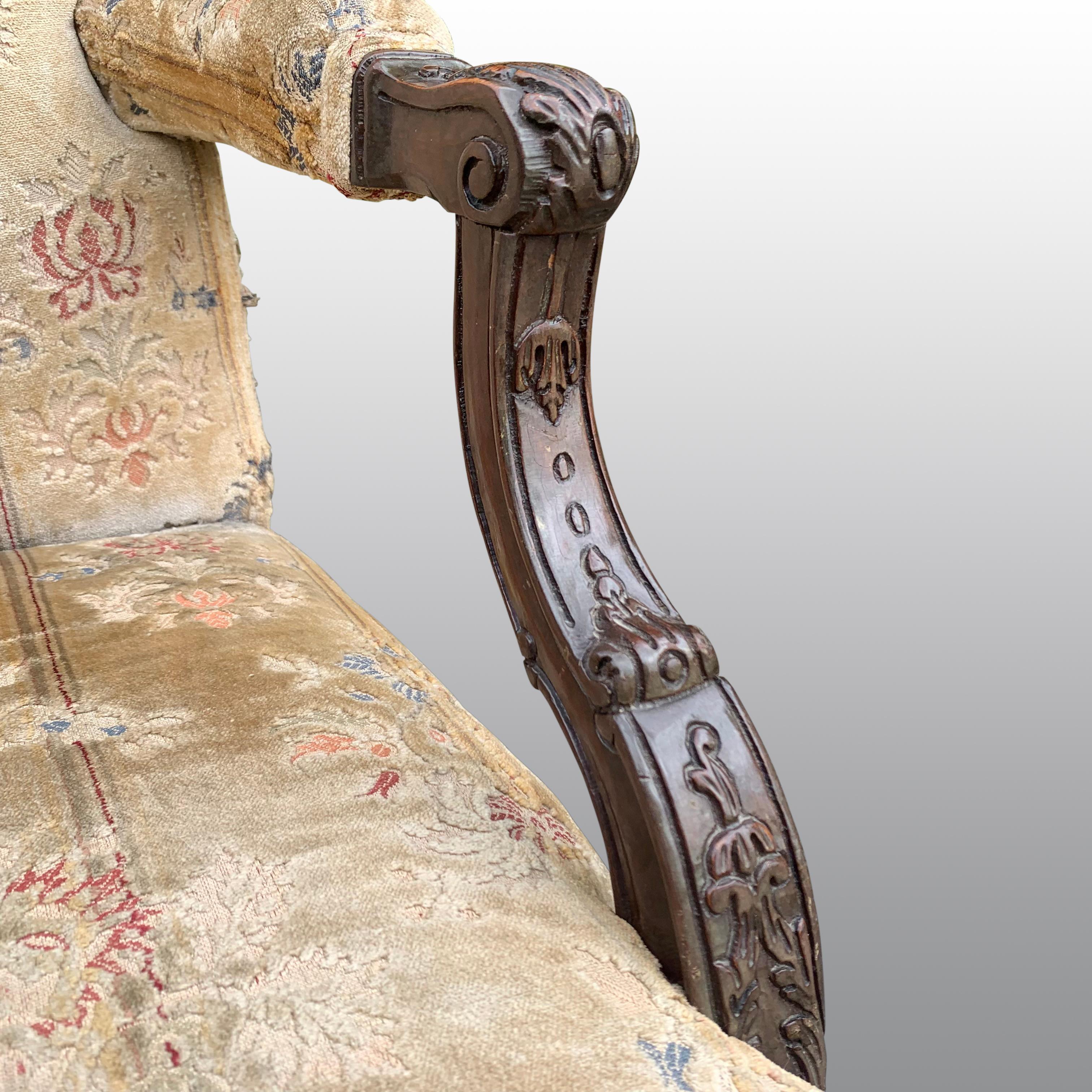 Mahogany Pair of Gainsborough Library chairs in the Chippendale taste