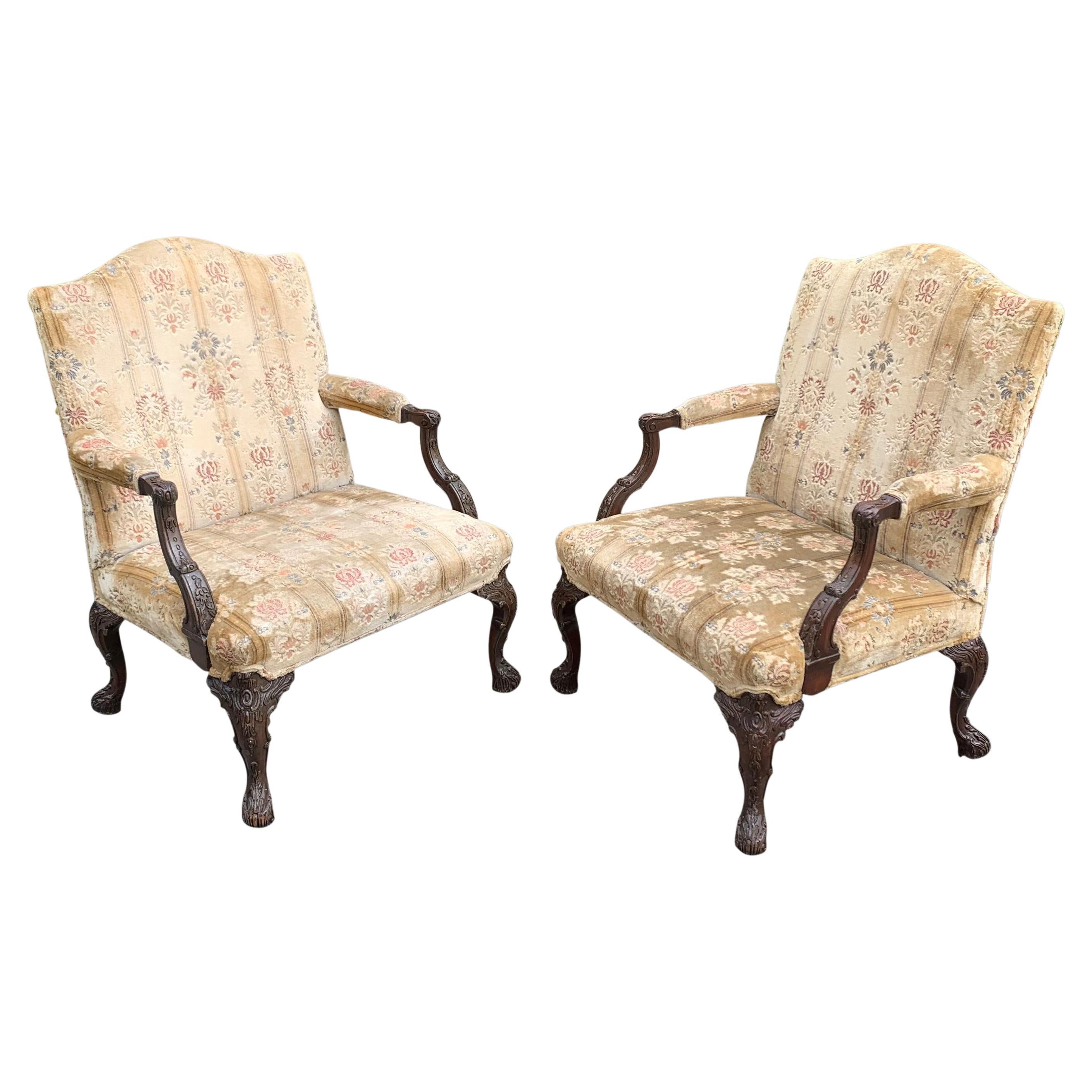 Pair of Gainsborough Library chairs in the Chippendale taste For Sale