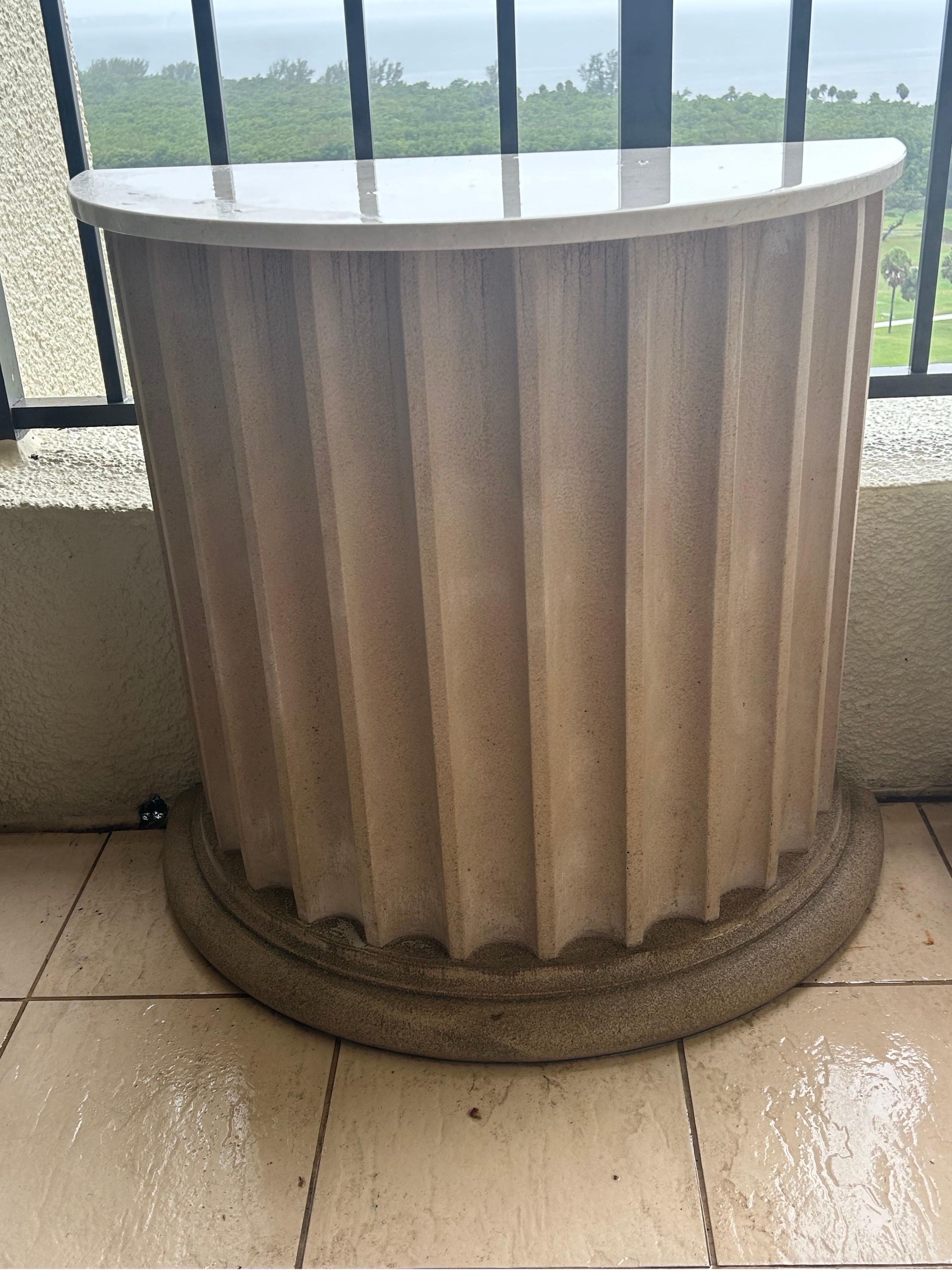 Neoclassical Pair of garden tables with marble tops on fluted demilune cast sandstone bases For Sale