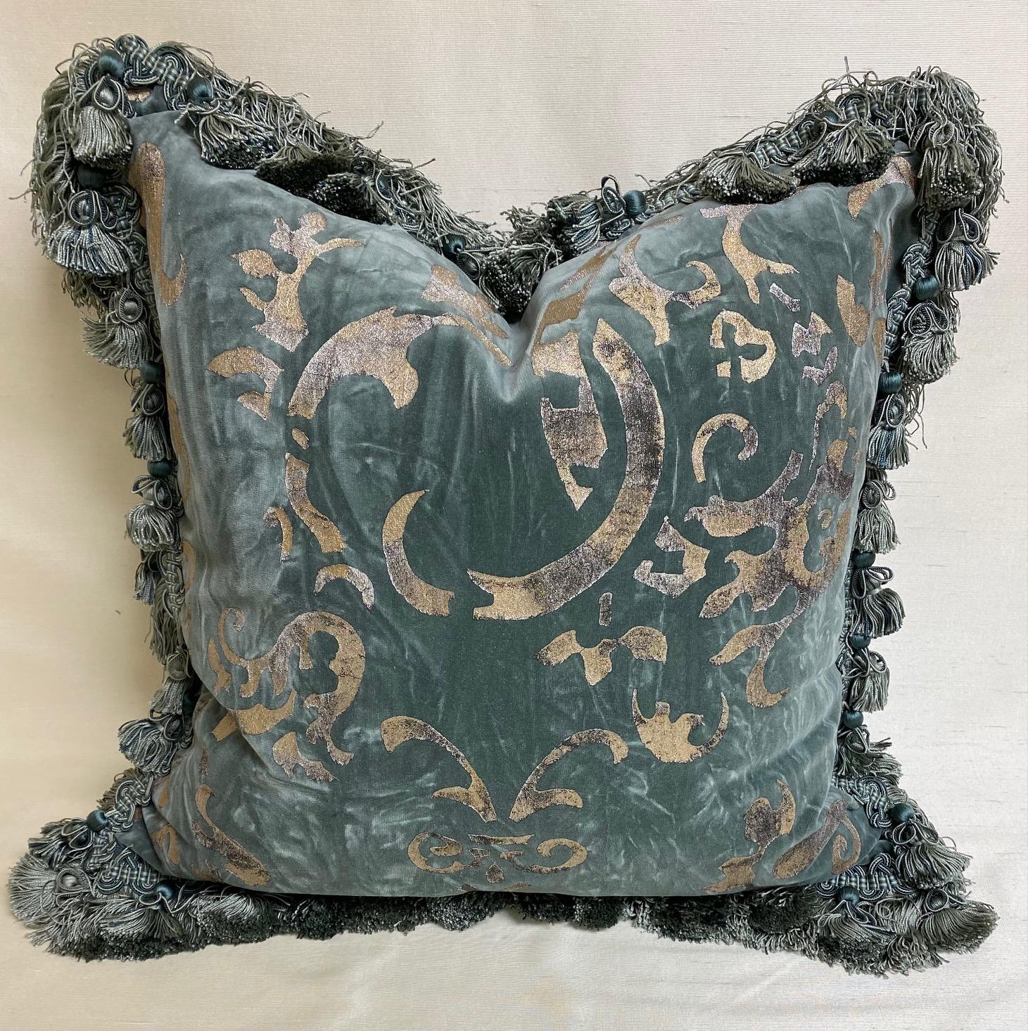Stunning pair of dark turquoise gaufrage velvet cushions with silk tassel fringe.
Measures: 22