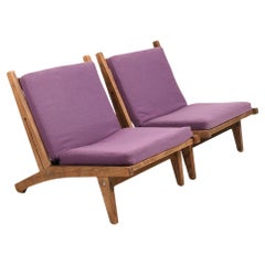 Pareja de butacas GE-375 en roble de Hans J. Wegner