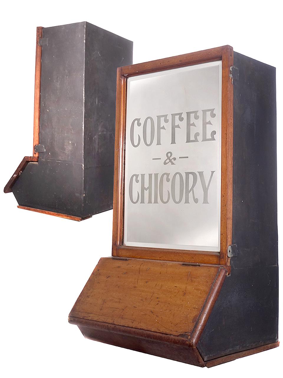 Original back counter coffee bean cabinets are impossible to find. This is a nice all original matching pair. The mirrors are beveled and read... fine blend... coffee and chicory. There is a tin lid that opens the top for filling and a slant wood