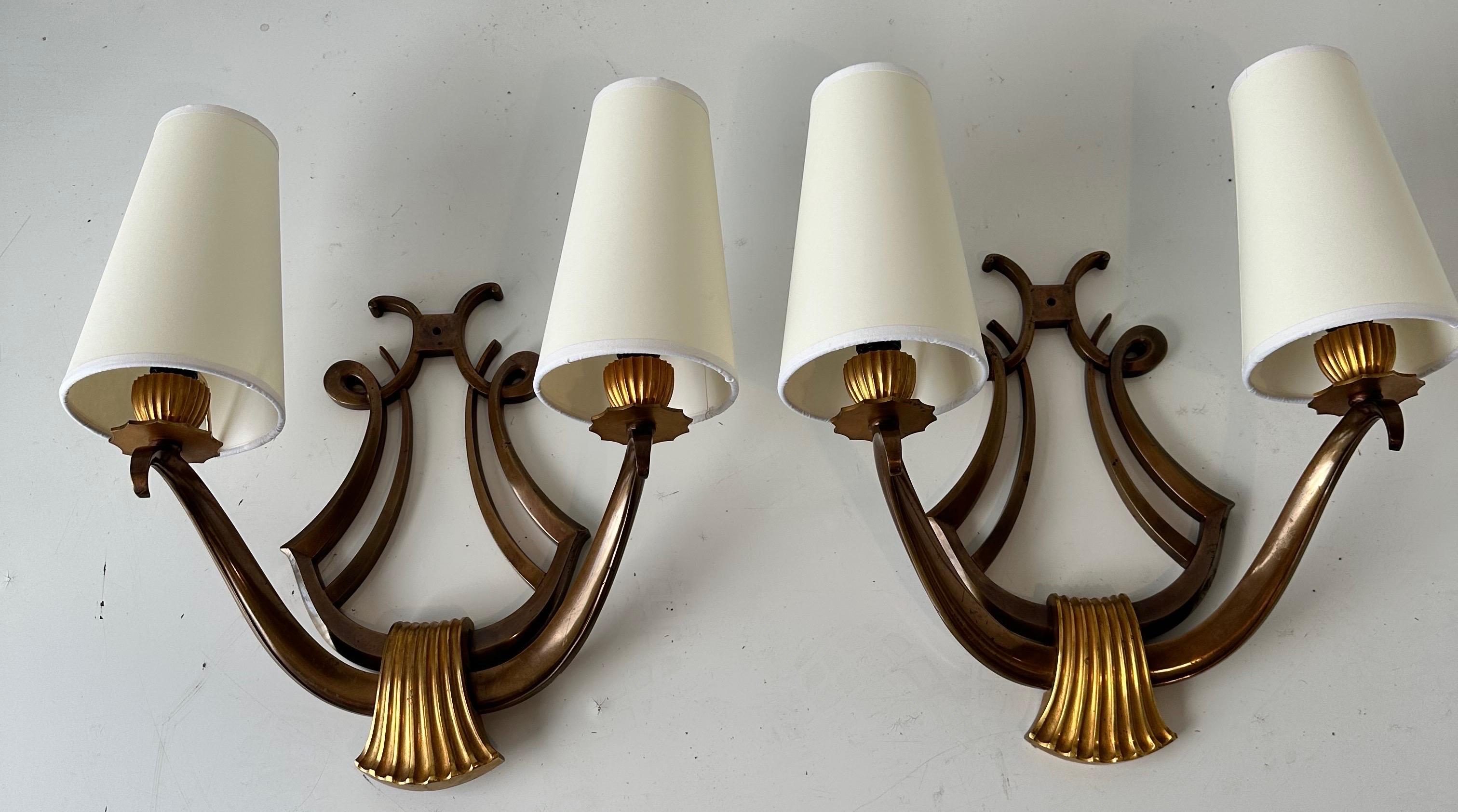 Exceptional Quality Pair of Signed Genet et Michon “Lyre” Bronze Sconces .
Signed and Numbered on the Back .
Two Patina Bronze .
US rewired.