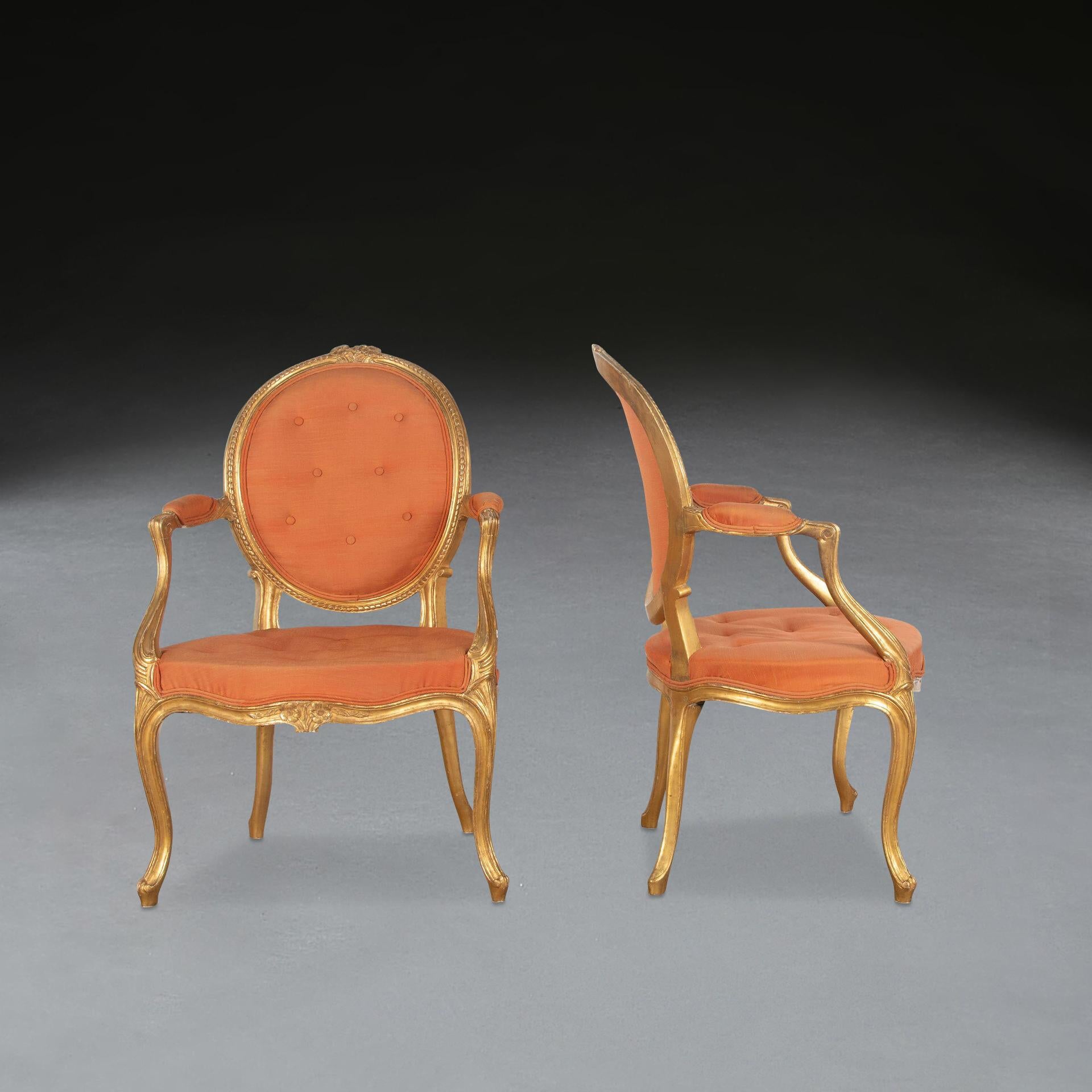 Carved Pair of Geo III Giltwood Open Armchairs For Sale