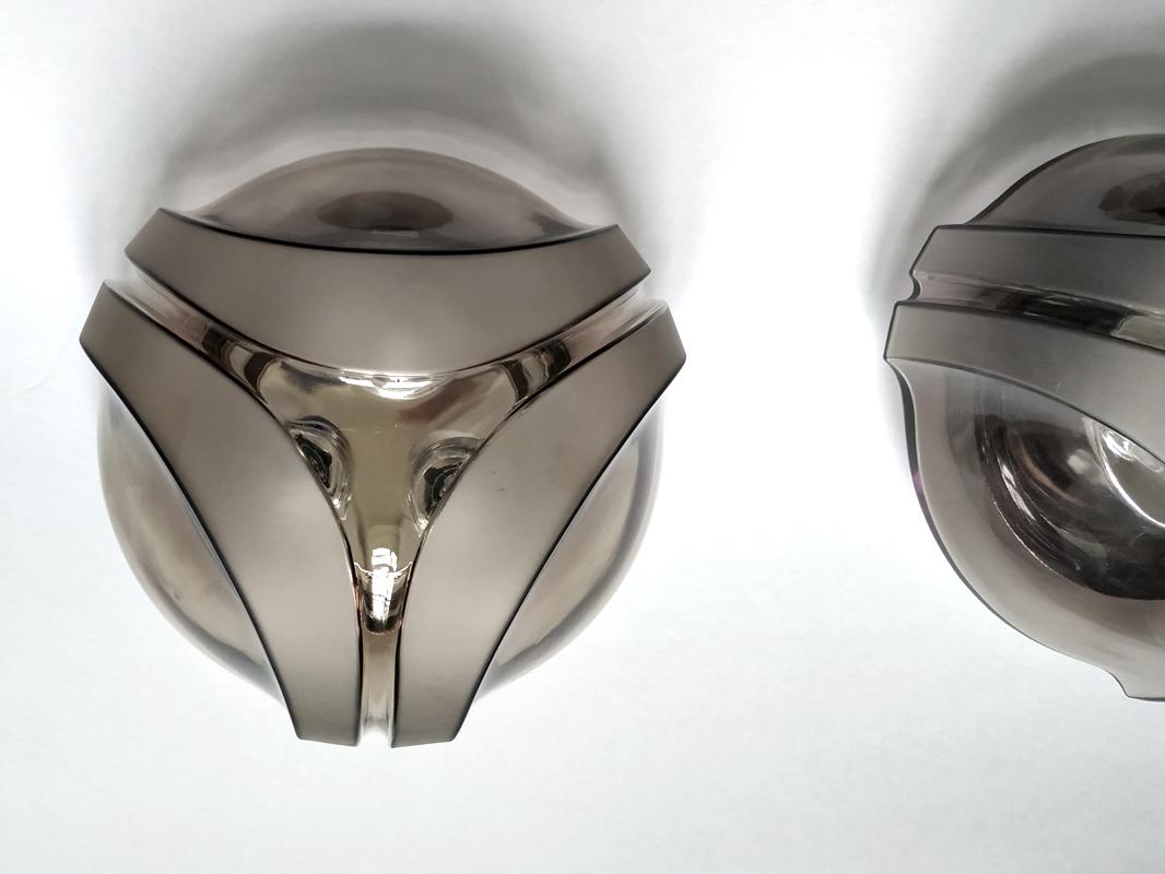 Pair of Architectural Space Age glass flush mounts. 
Germany, 1970s.
Lamp sockets: 3.