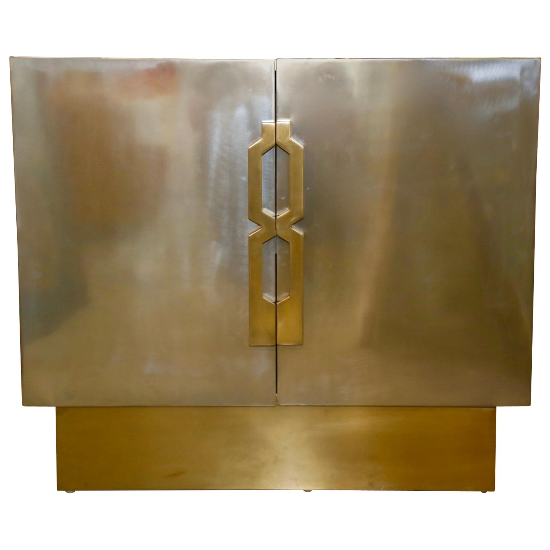 A pair of bridges over time originals nightstands or end tables designed by MarCo Antonio. One shelf in each. They are coated in stainless and brass. Please note we have a matching credenza for sale as well Minor imperfections as these are handmade.