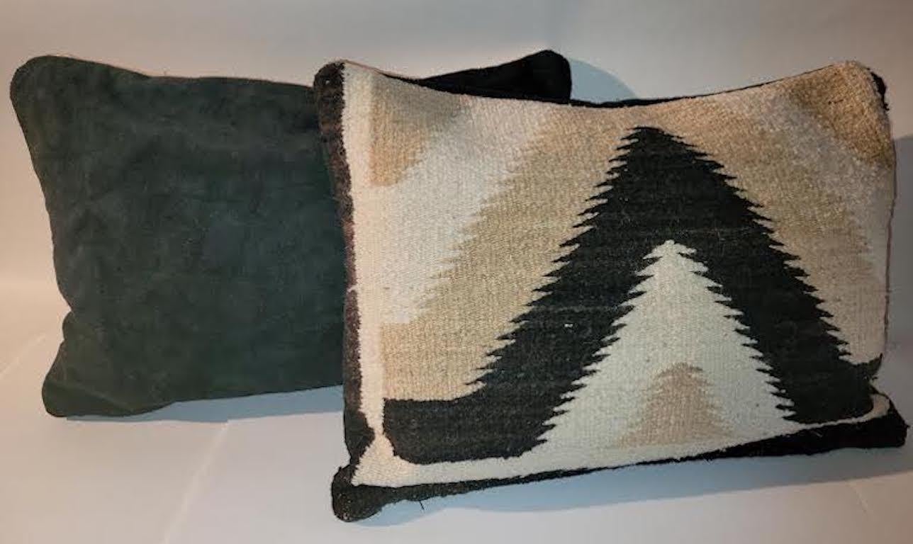 Purchase Pair or Single Geometric Navajo Territory Indian Weaving Pillows Custom Made. Backing is Black Suede. New Feather and Down Insert.

Pair of PillowsPrice: 1,695.00

Single Pillow Price: 895.00.