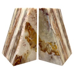 Coppia di reggilibri geometrici in Onice