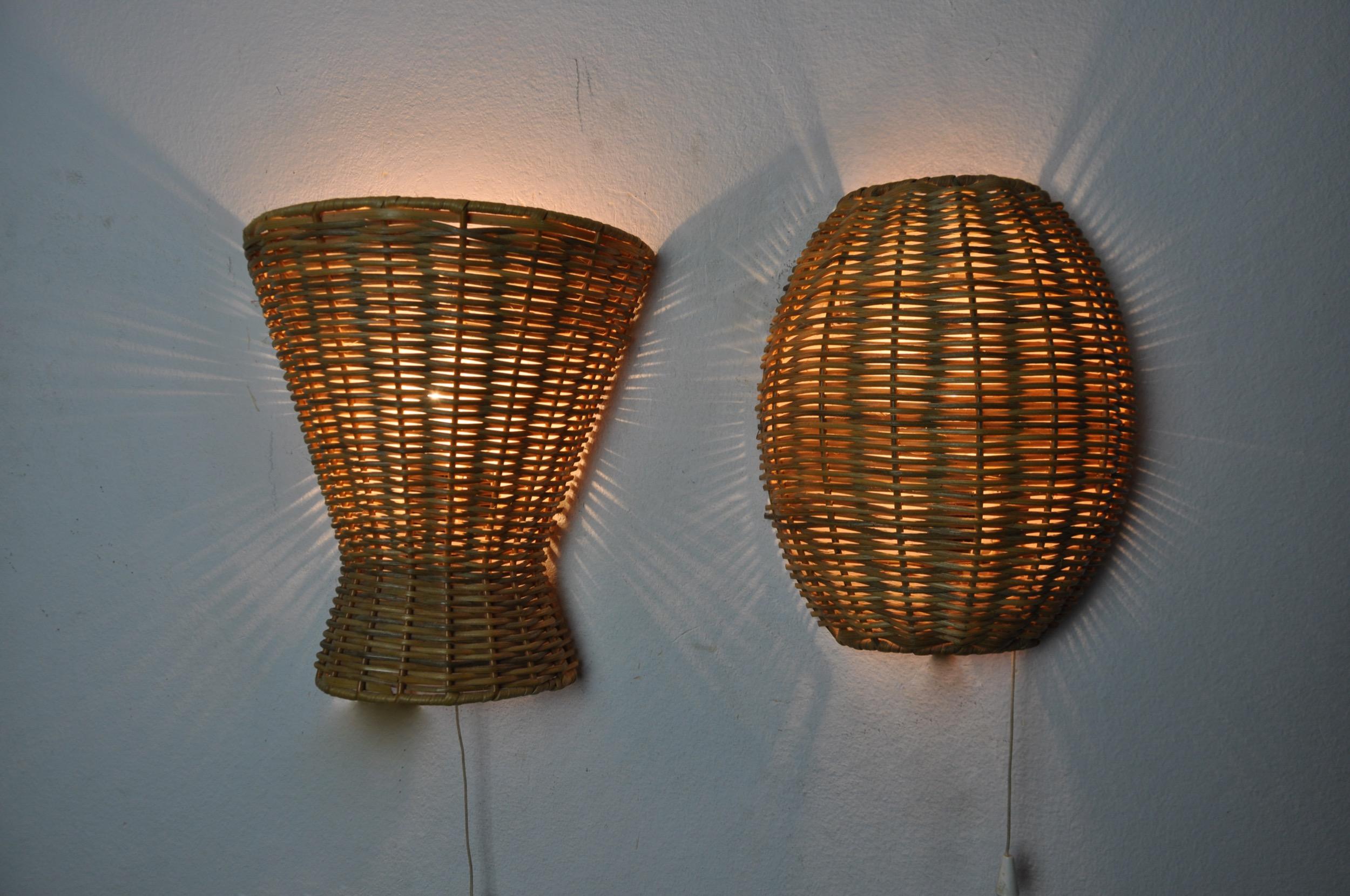 Very beautiful and rare pair of geometric rattan wall lights designed and produced in France in the 1960s. Rope switch which adds character with these two wall lights. Classic design that will wonderfully illuminate your interior. Electricity