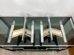 Paire d'appliques géométriques de Sciolari:: chrome et laiton:: Italie:: 1970