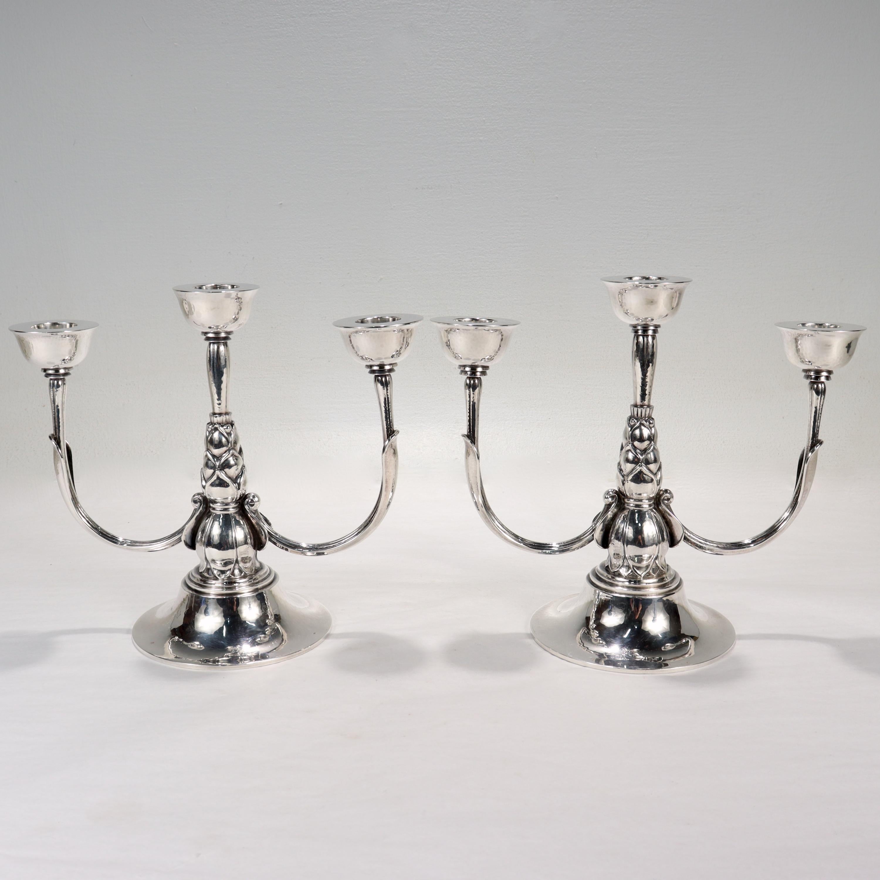 Women's or Men's Pair of Georg Jensen Art Deco 537 C Sterling Silver Candelabra by Harald Nielsen For Sale