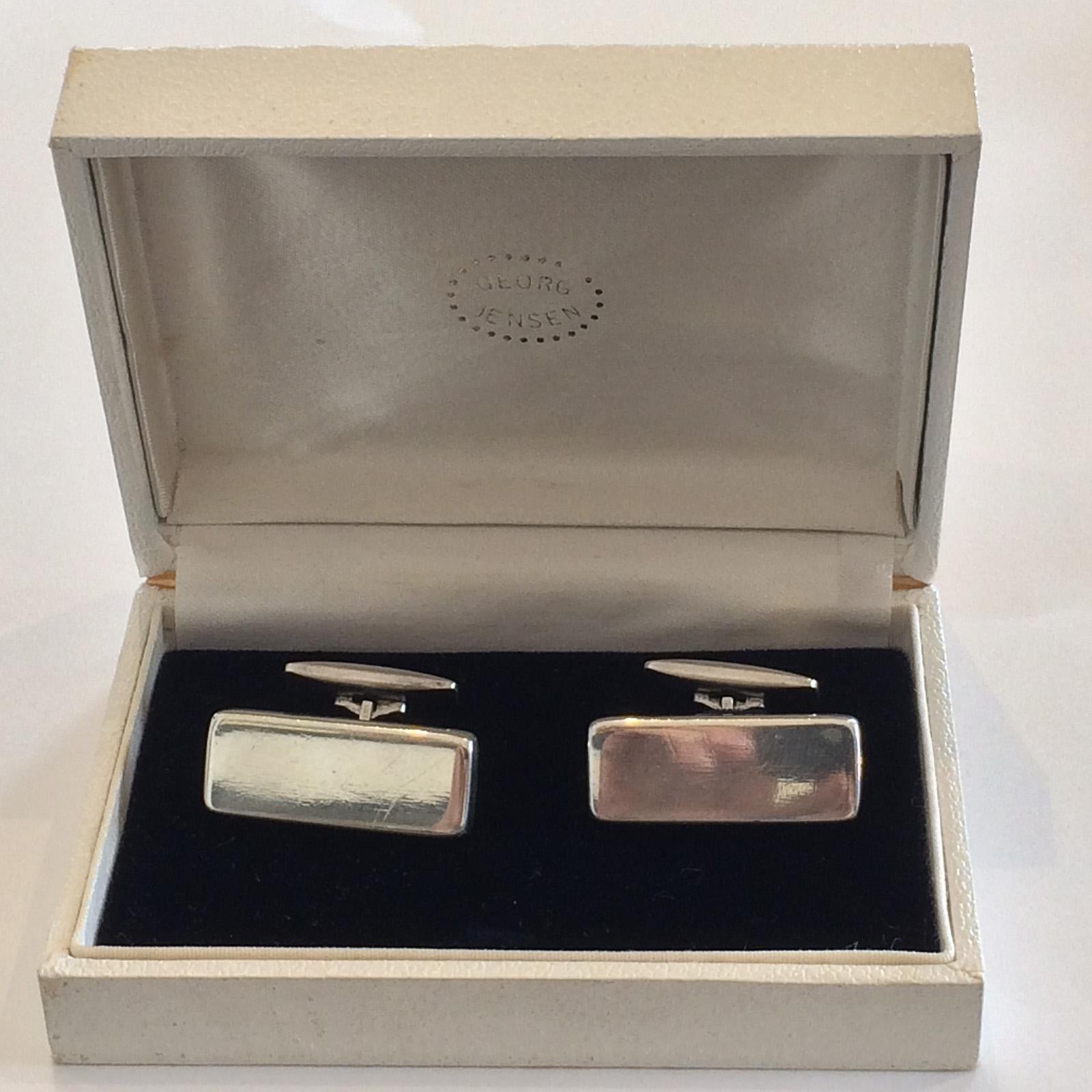 Early Cufflinks by Georg Jensen, Modernist Design Numbered 117 in original Box. Of larger proportions in cubic shapes, designed by Astrid Fog for Jensen. Fully Hallmarked with GEORG over JENSEN, within a dotted Ellipse, followed by 925S over